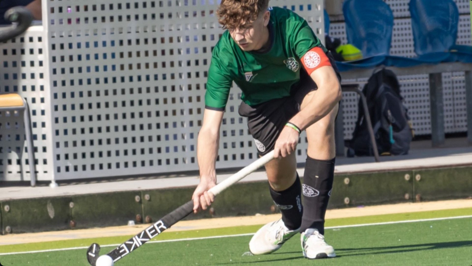 person wearing grey knit sweater