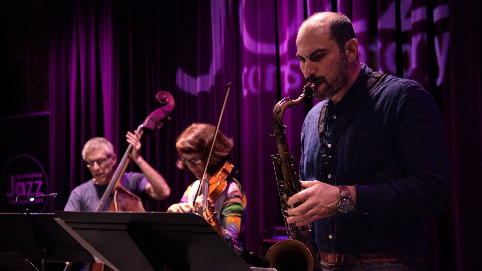 woman wearing yellow long-sleeved dress under white clouds and blue sky during daytime