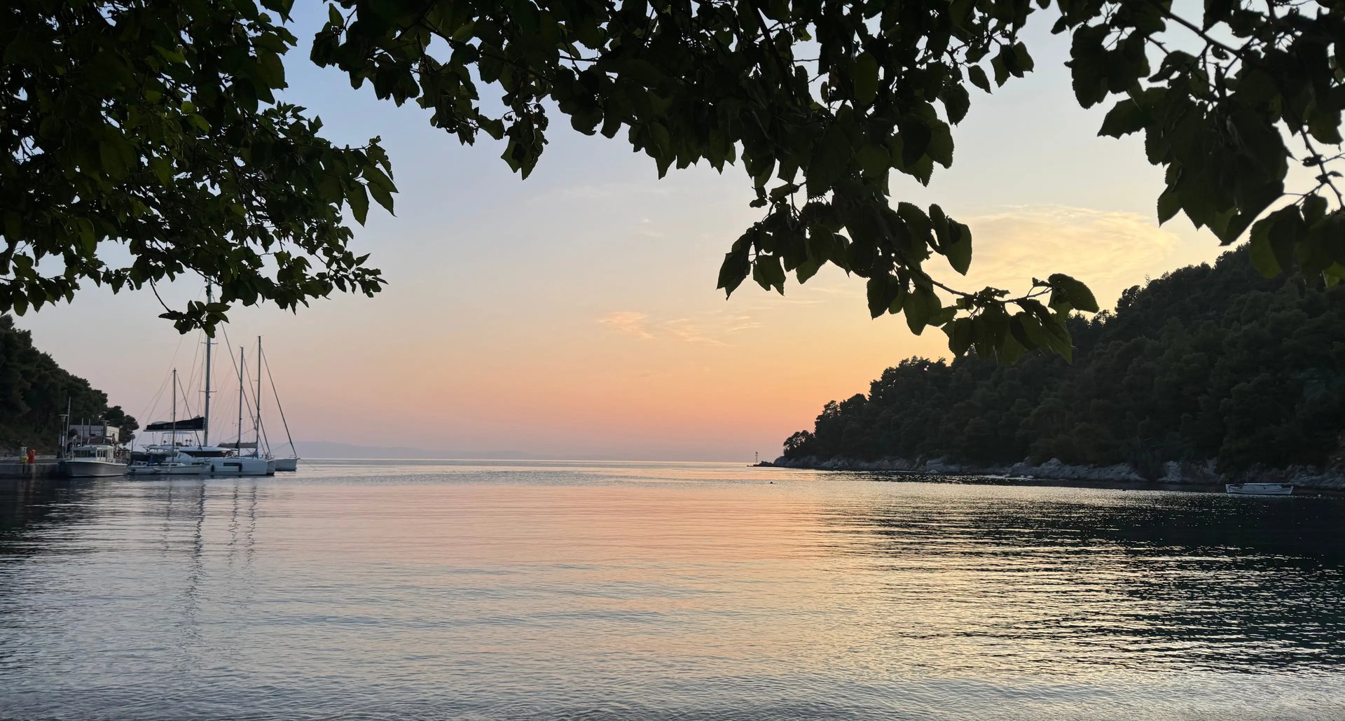 dhm.style lifestyle cover background with sunset view and yachts.