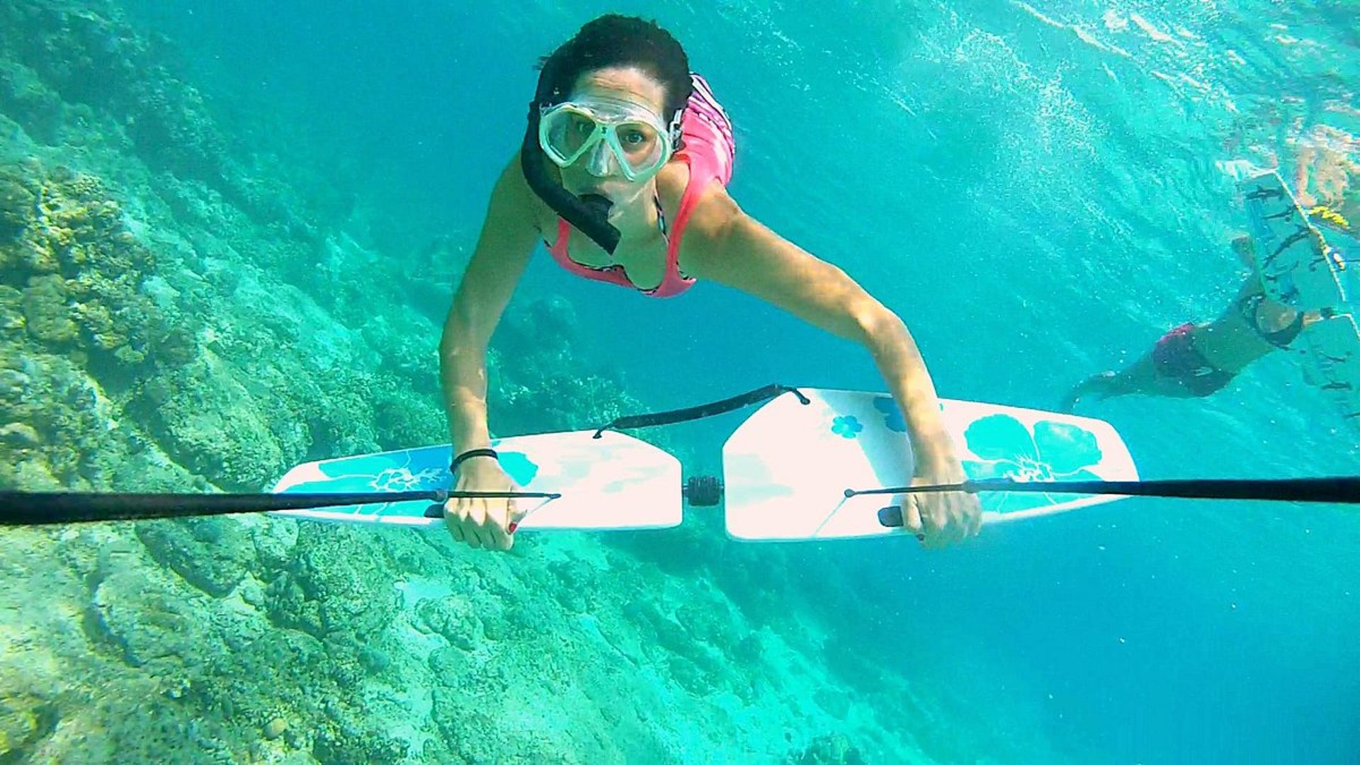a man paddle boarding
