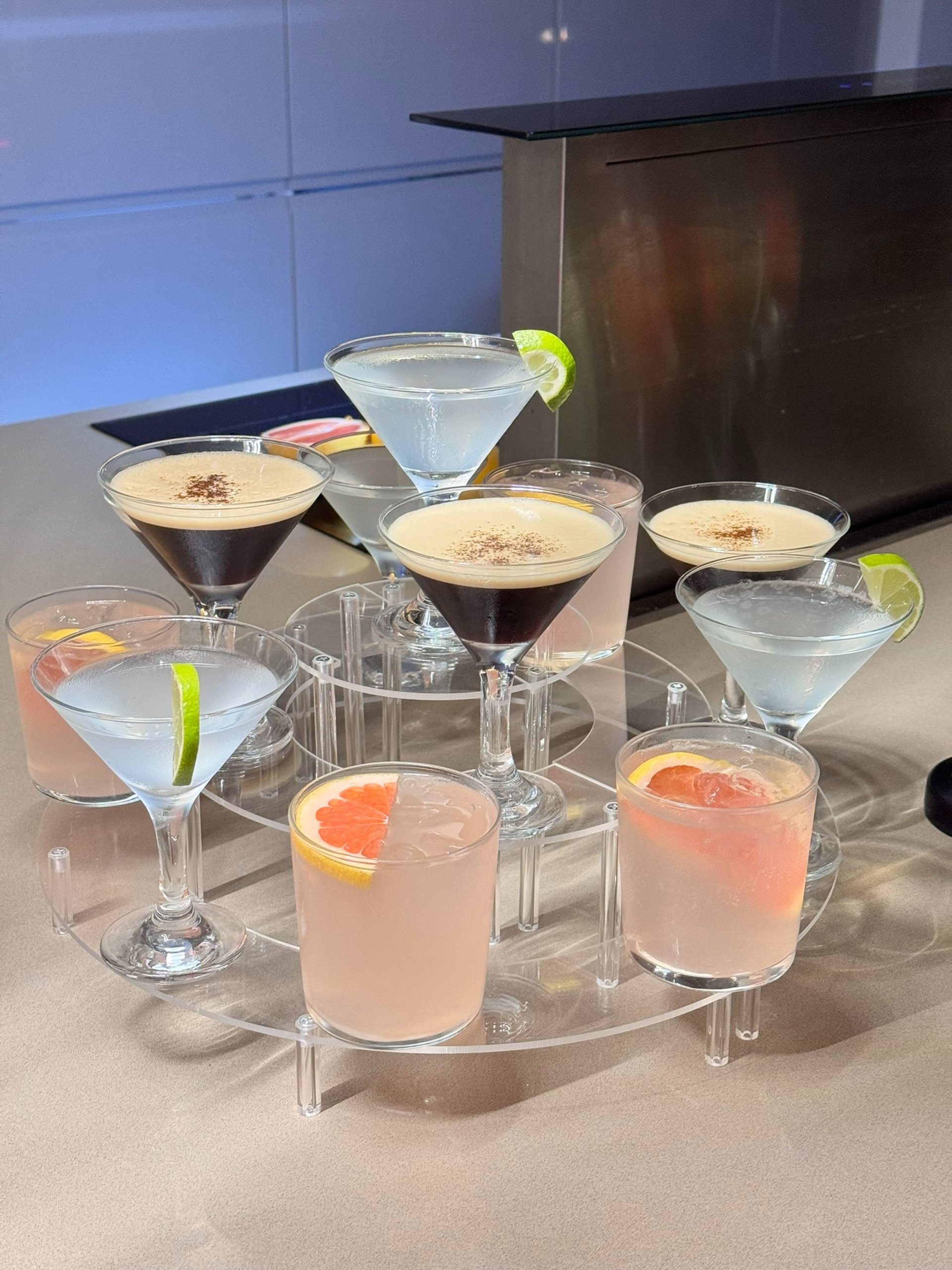 group of people holding footed glasses