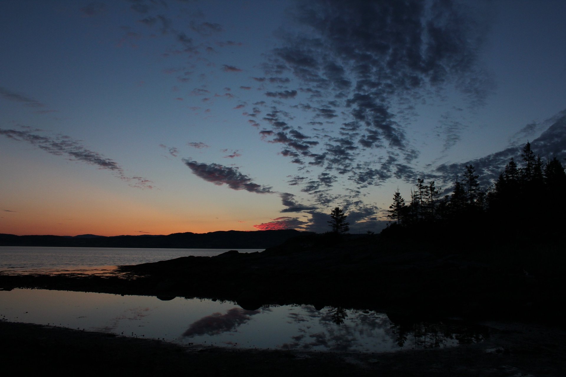 mountain range under blue sky