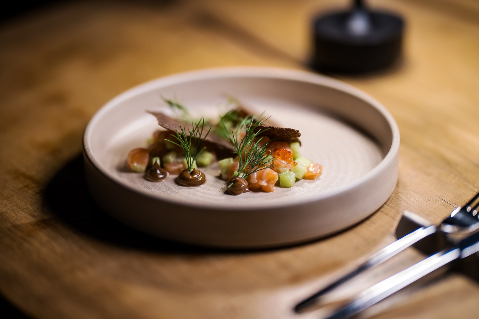 black and brown leather padded tub sofa