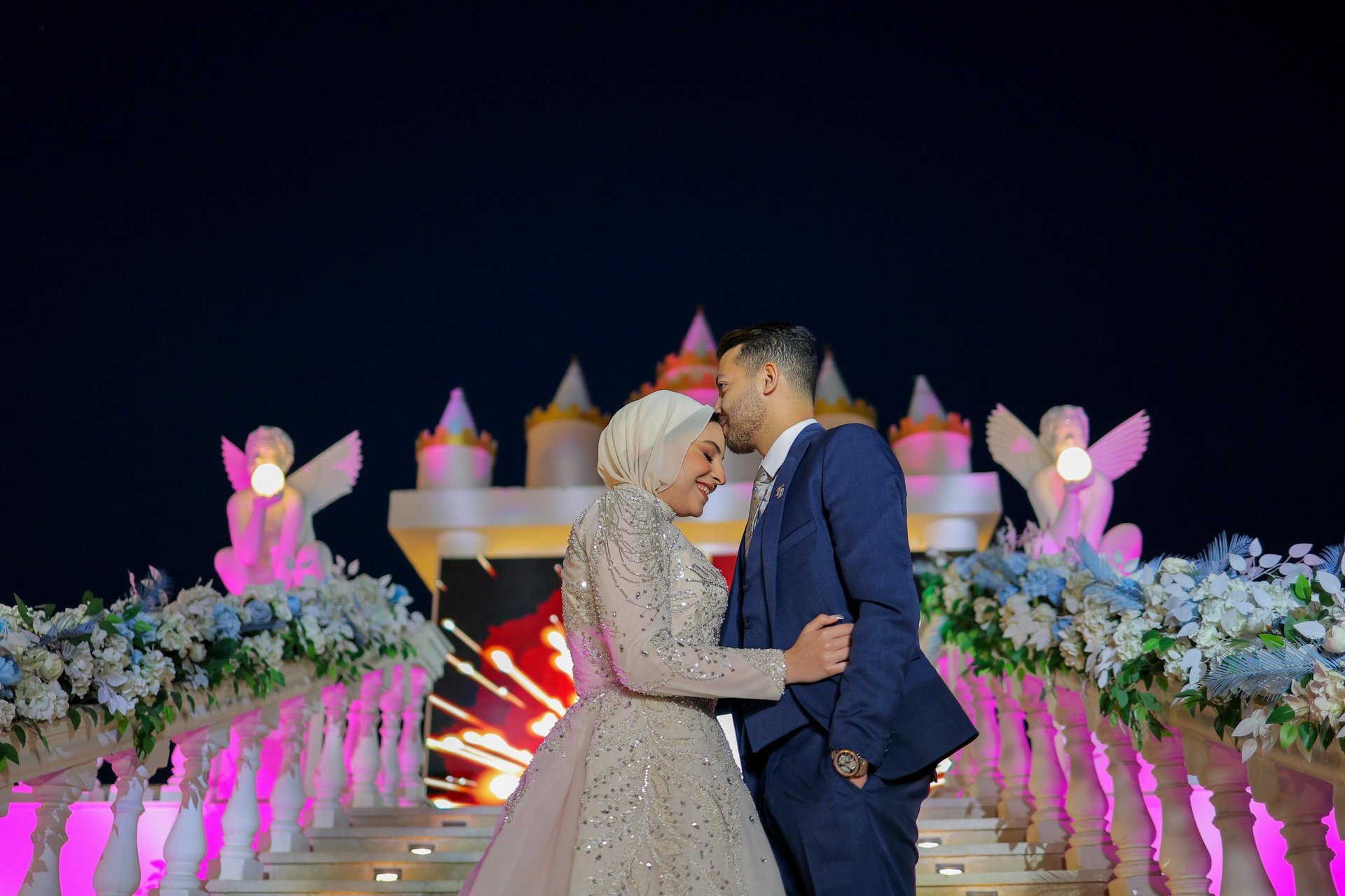 couple wearing silver-colored rings