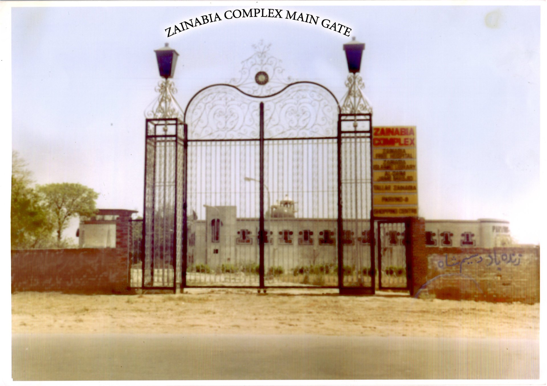 white and blue concrete building near body of water during daytime