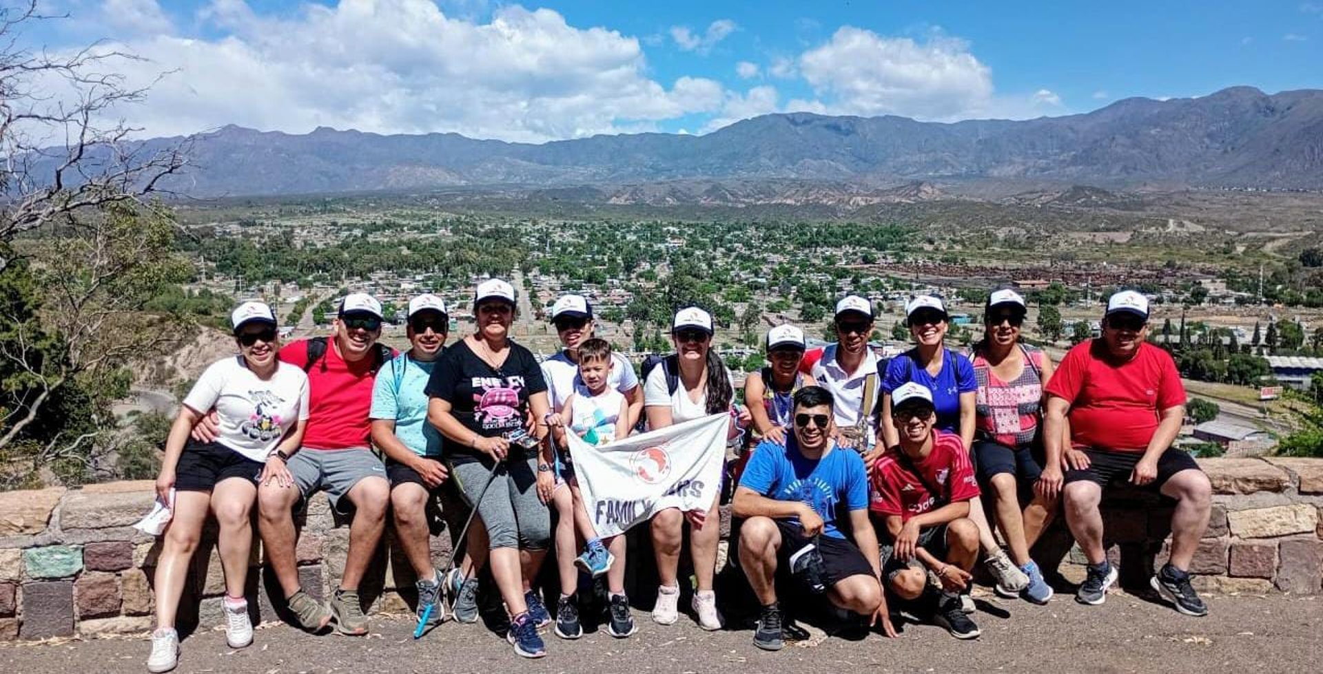 woman holding man and toddler hands during daytime