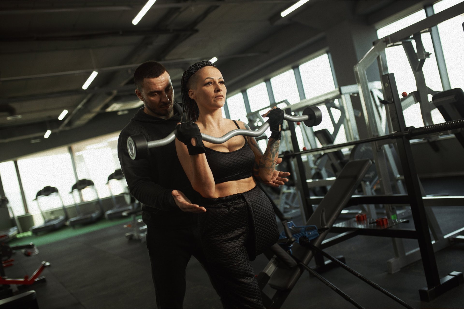 an abstract photo of a curved building with a blue sky in the background