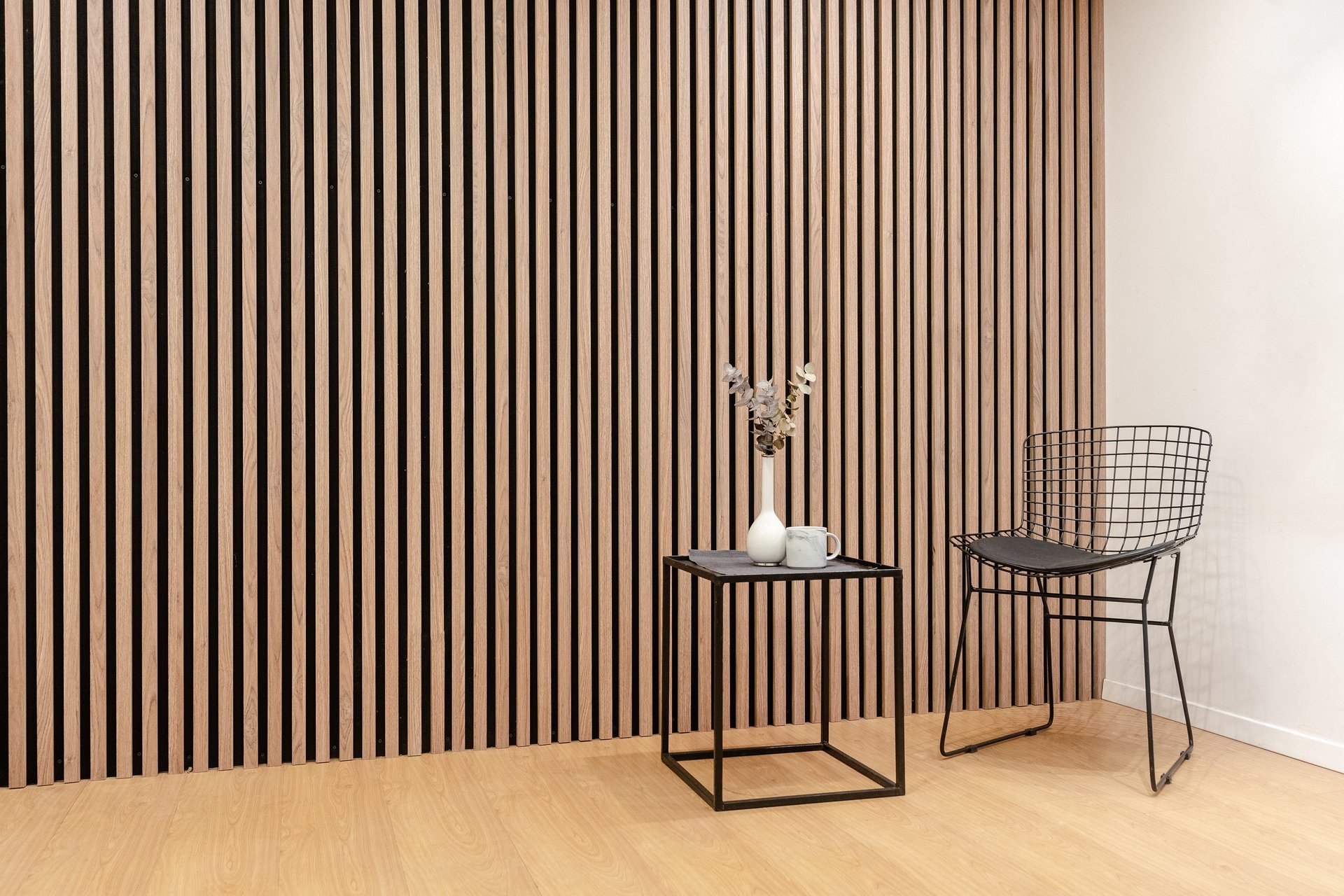 an abstract photo of a curved building with a blue sky in the background