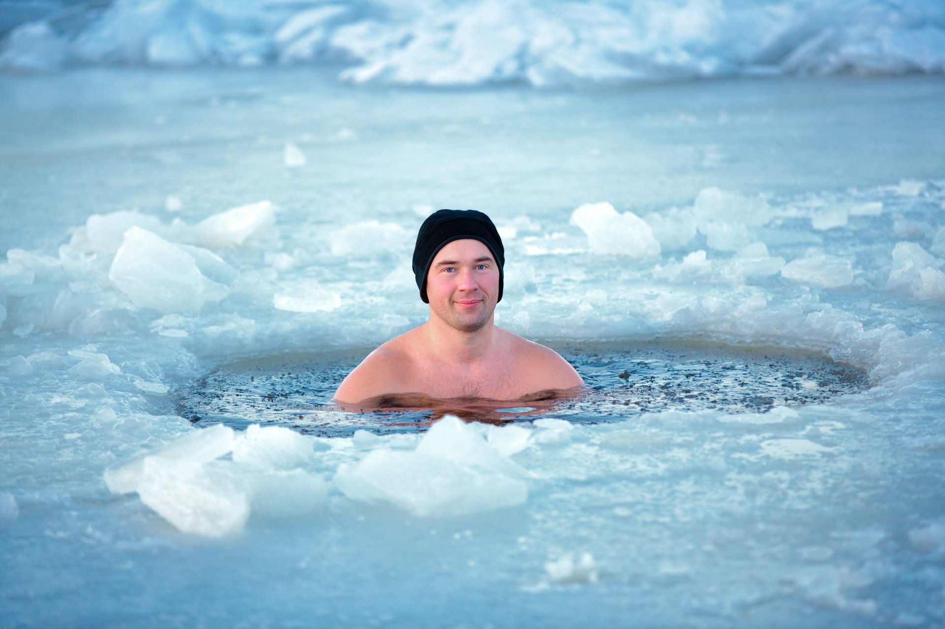 person swimming on beach