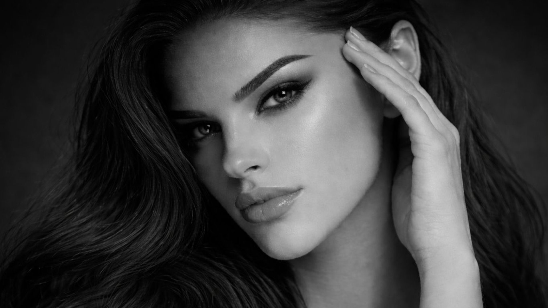 black and brown leather padded tub sofa