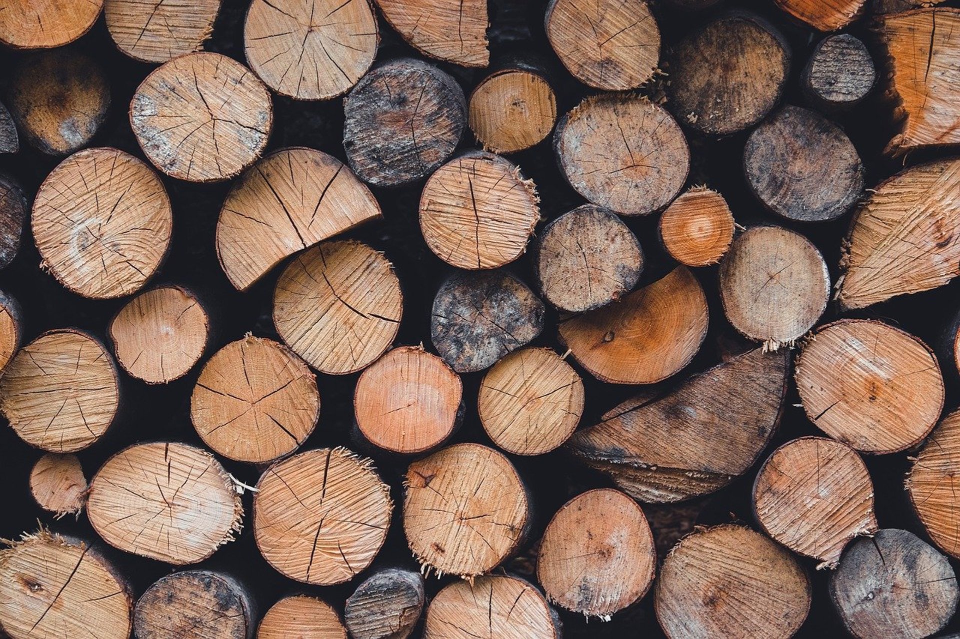 an abstract photo of a curved building with a blue sky in the background