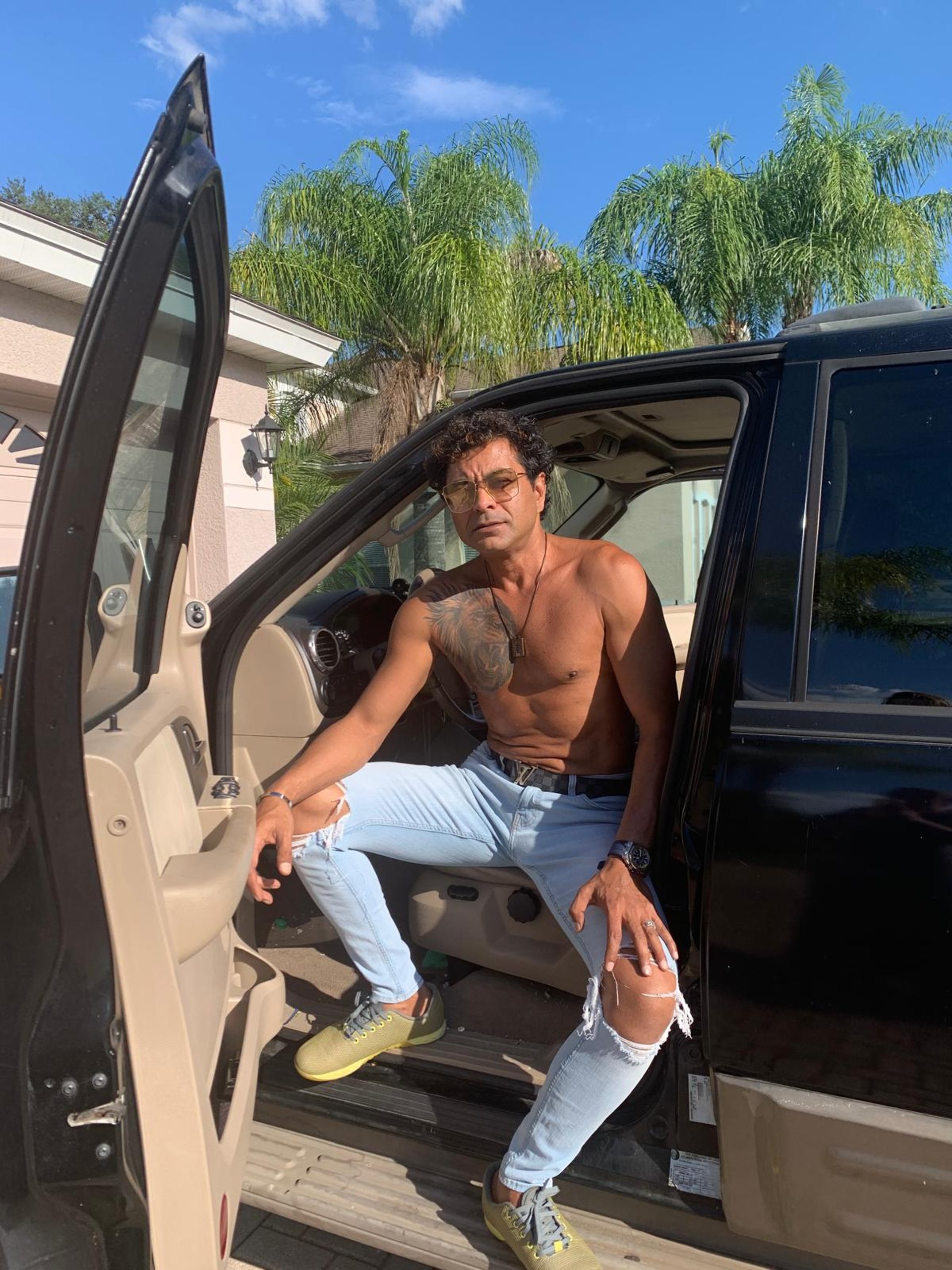 black and brown leather padded tub sofa