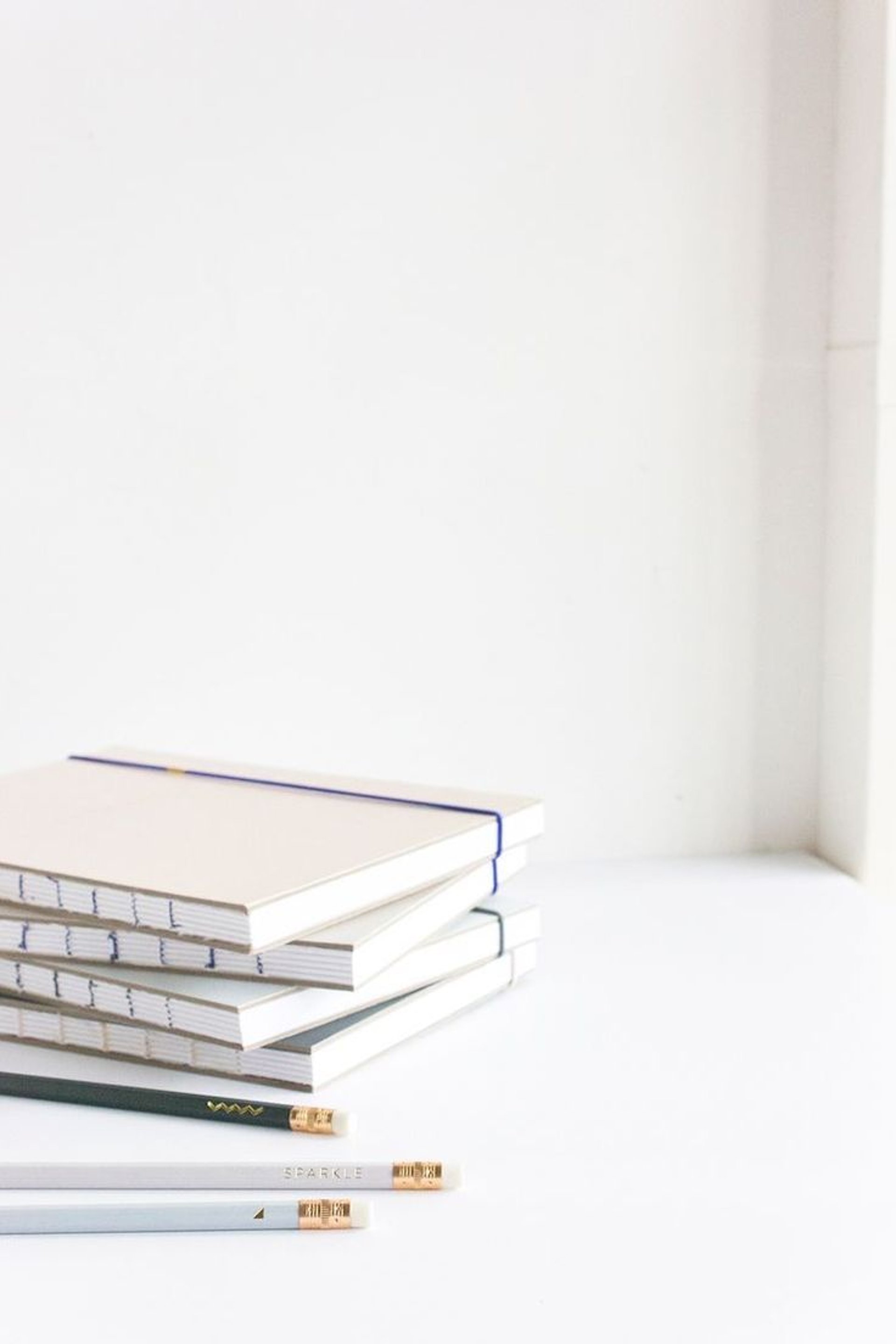 a book open on a bed
