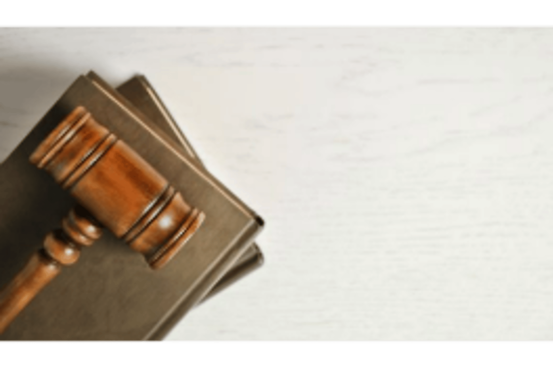 brown wooden tool on white surface