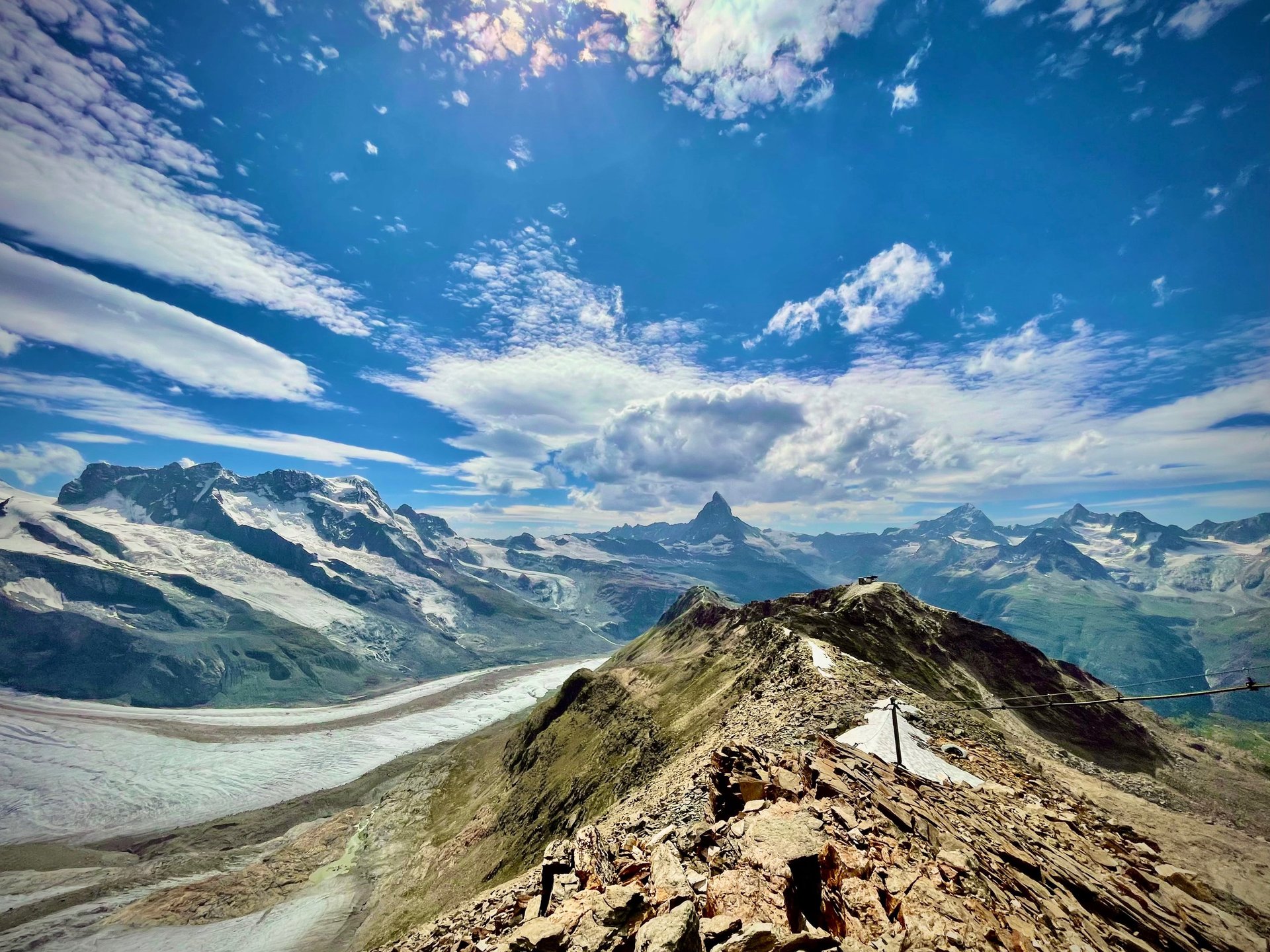 mountain range under blue sky