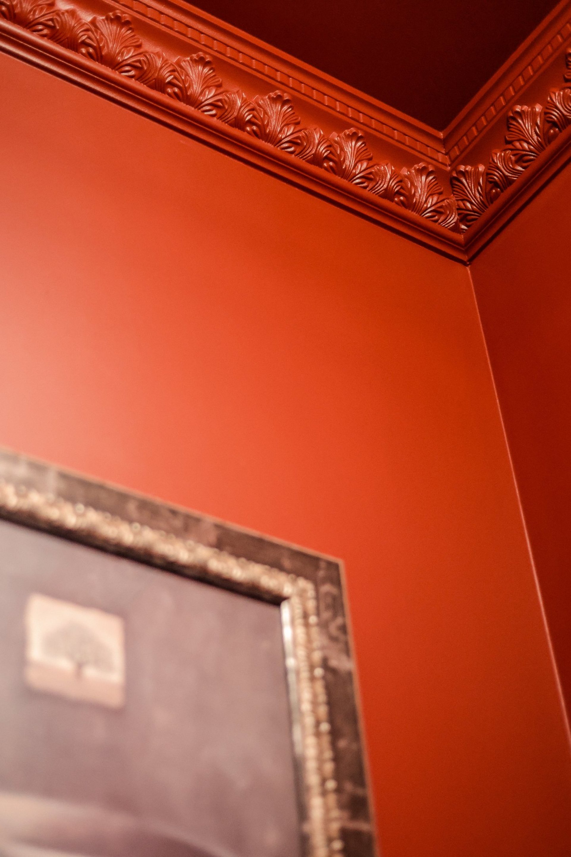 brown wooden kitchen shelf with ceramic jars on top
