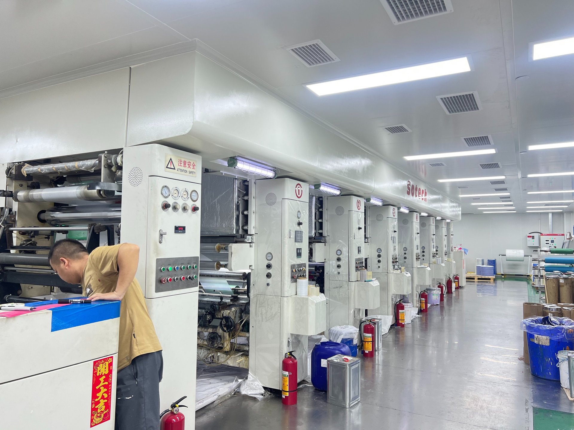an abstract photo of a curved building with a blue sky in the background