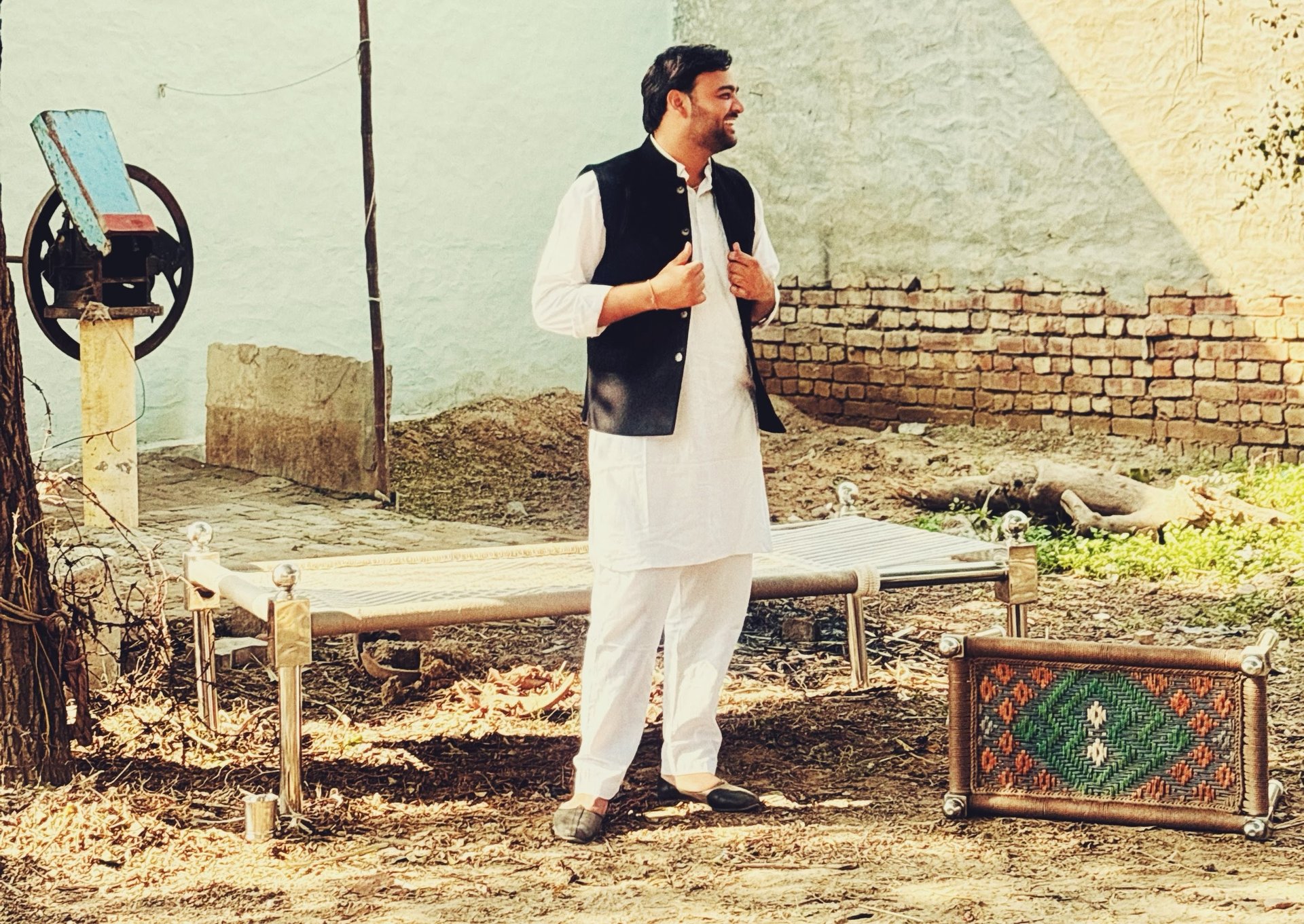 an abstract photo of a curved building with a blue sky in the background