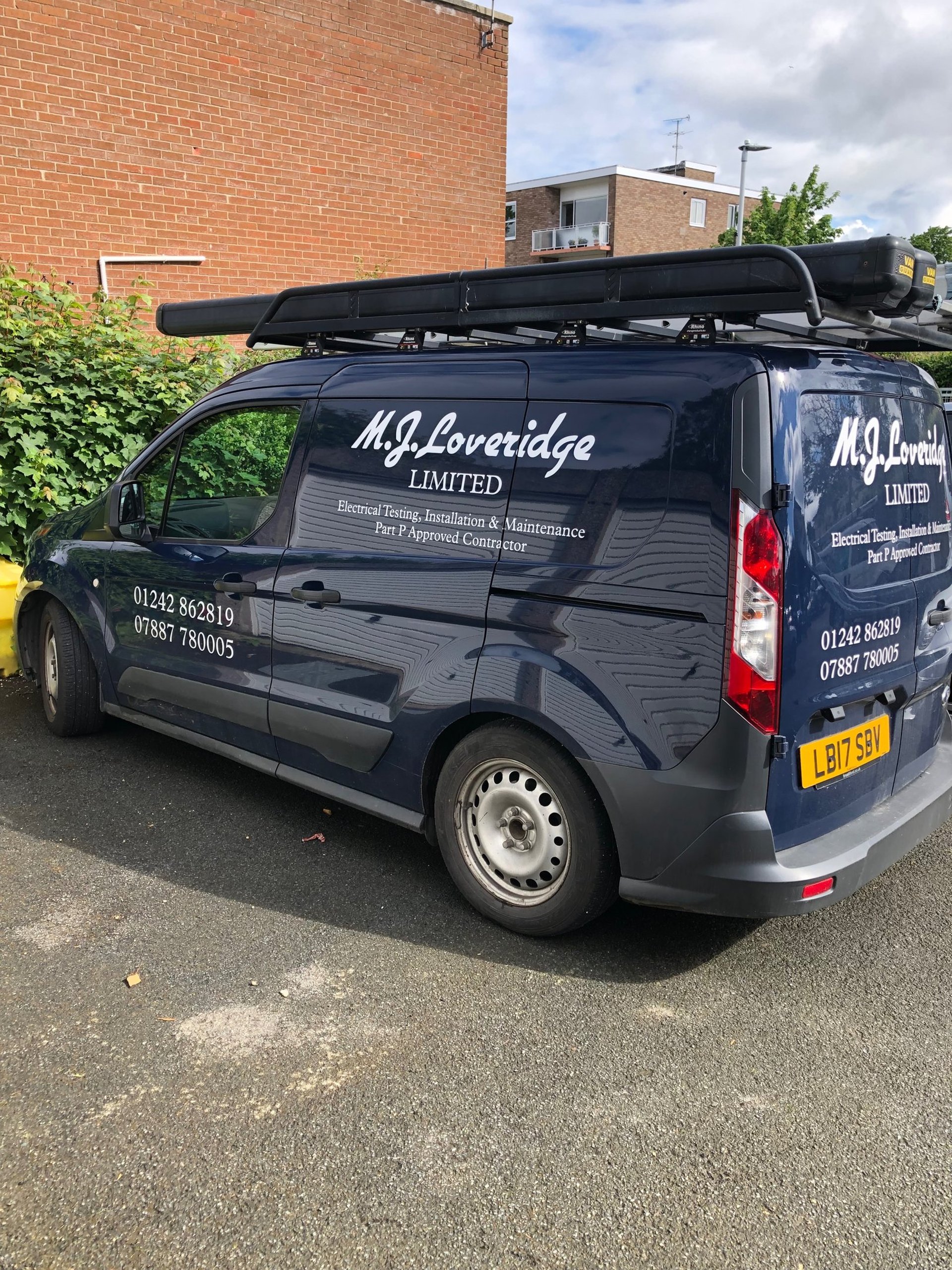 black and brown leather padded tub sofa