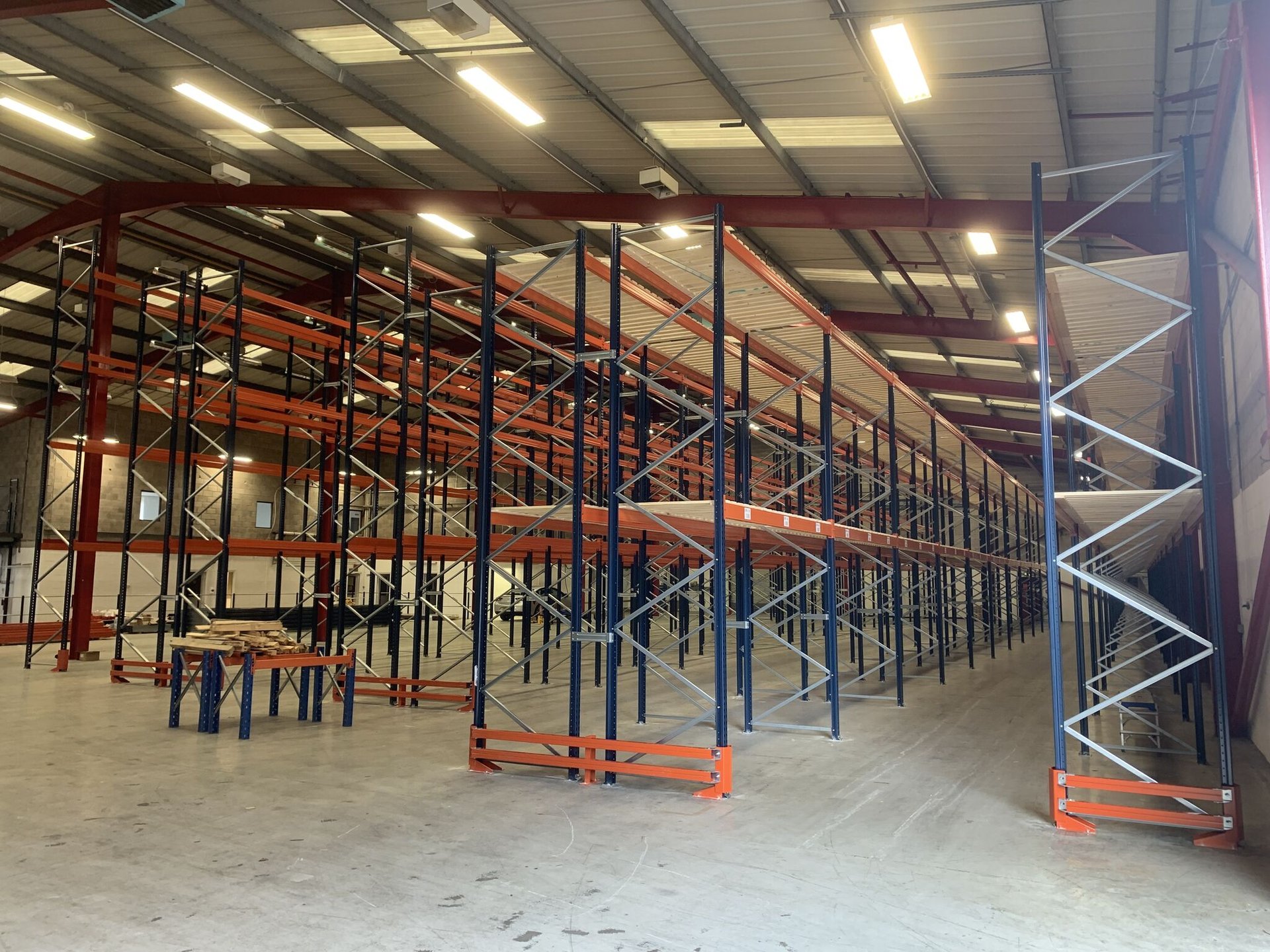 tall pallet racking in narrow aisle configuration with rack end protectors  