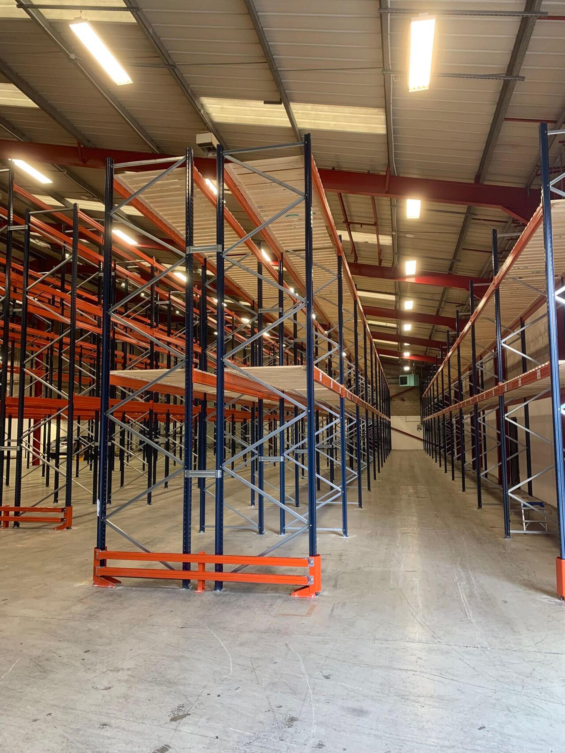 tall pallet racking in narrow aisle configuration with rack end protectors  