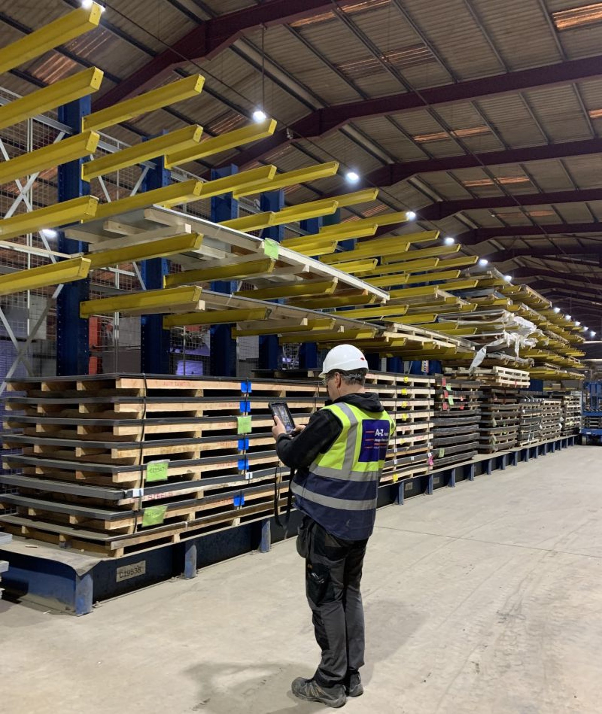 tall pallet racking in narrow aisle configuration with rack end protectors  