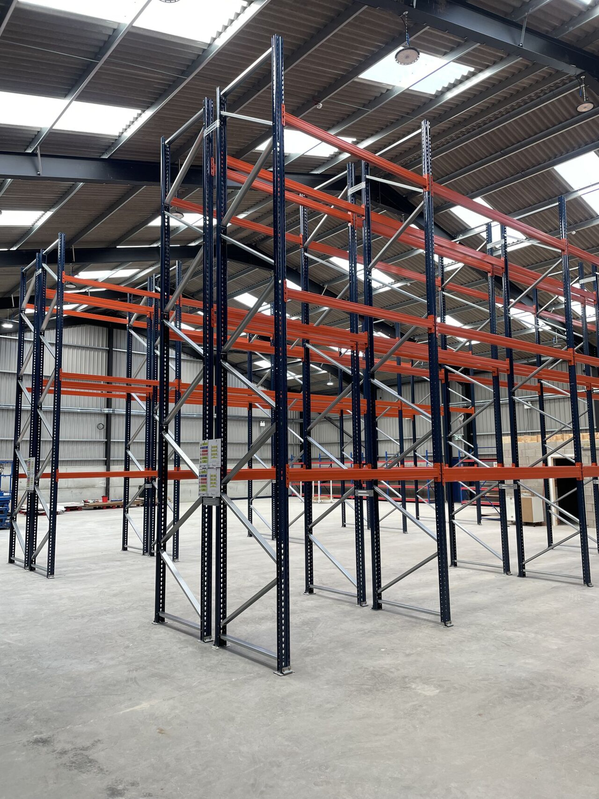 tall pallet racking in narrow aisle configuration with rack end protectors  