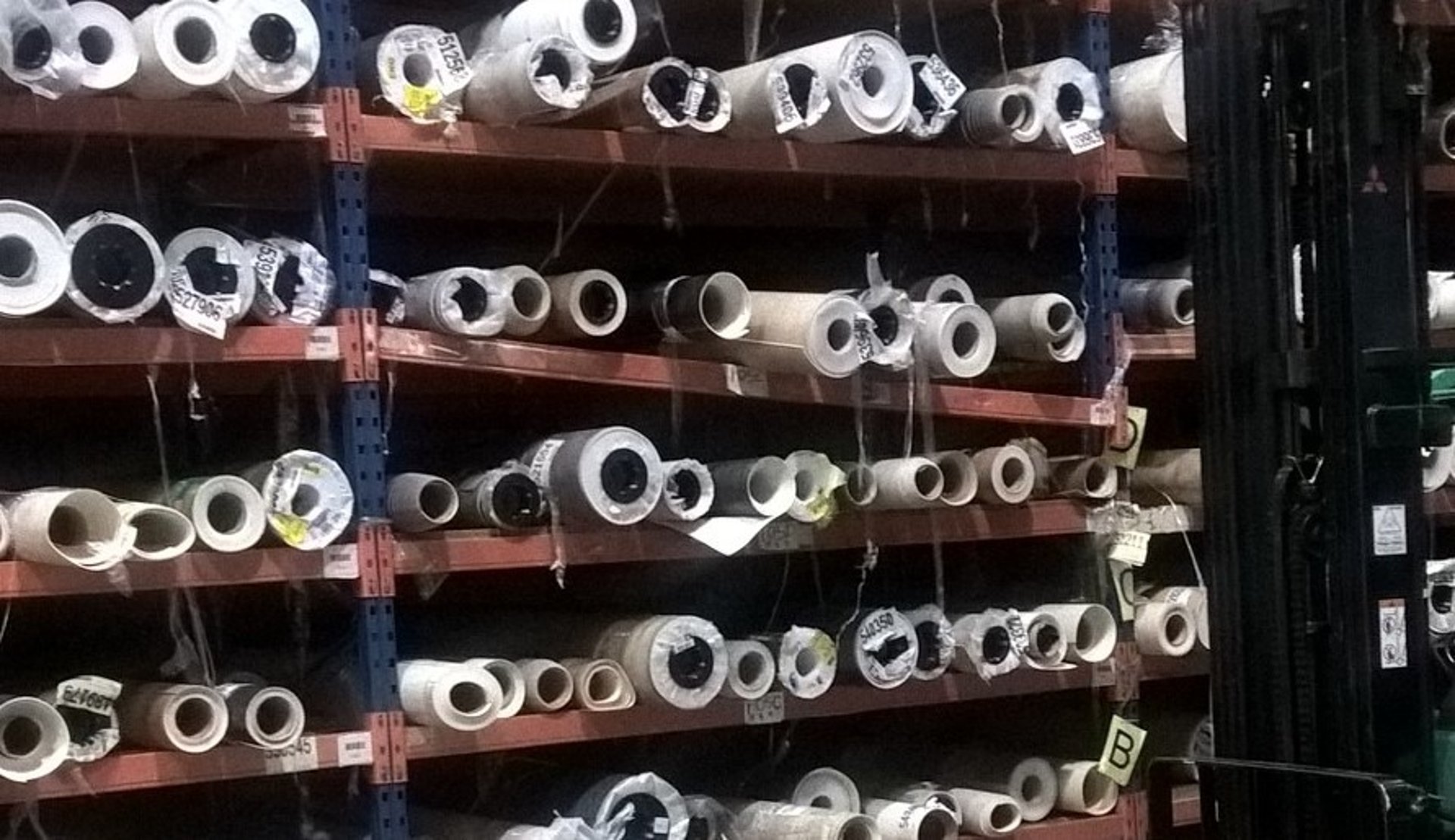 tall pallet racking in narrow aisle configuration with rack end protectors  