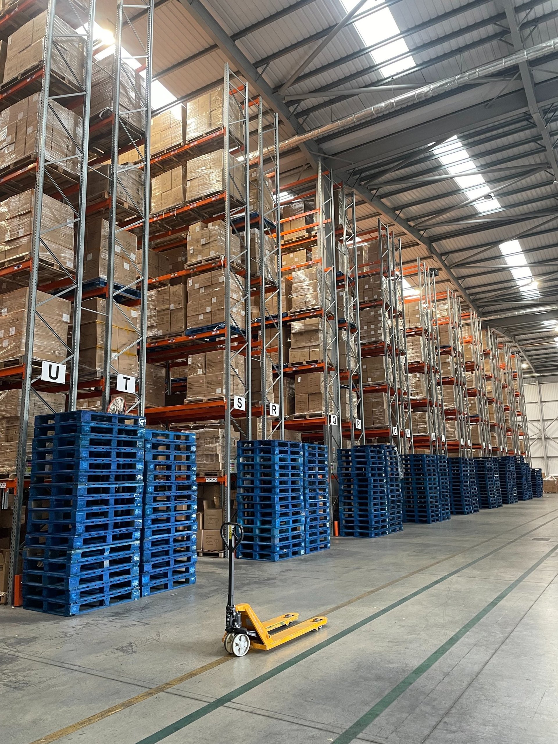 tall pallet racking in narrow aisle configuration with rack end protectors  
