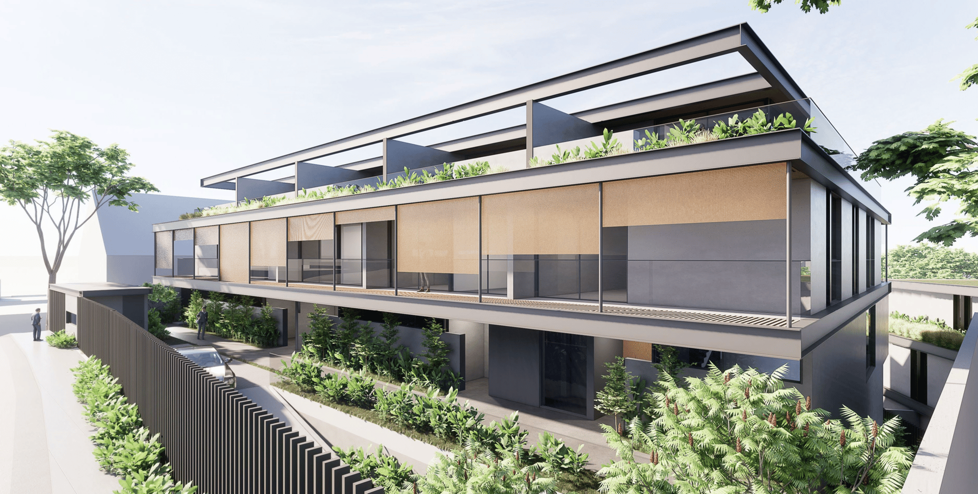a woman sitting at a table writing on a piece of paper