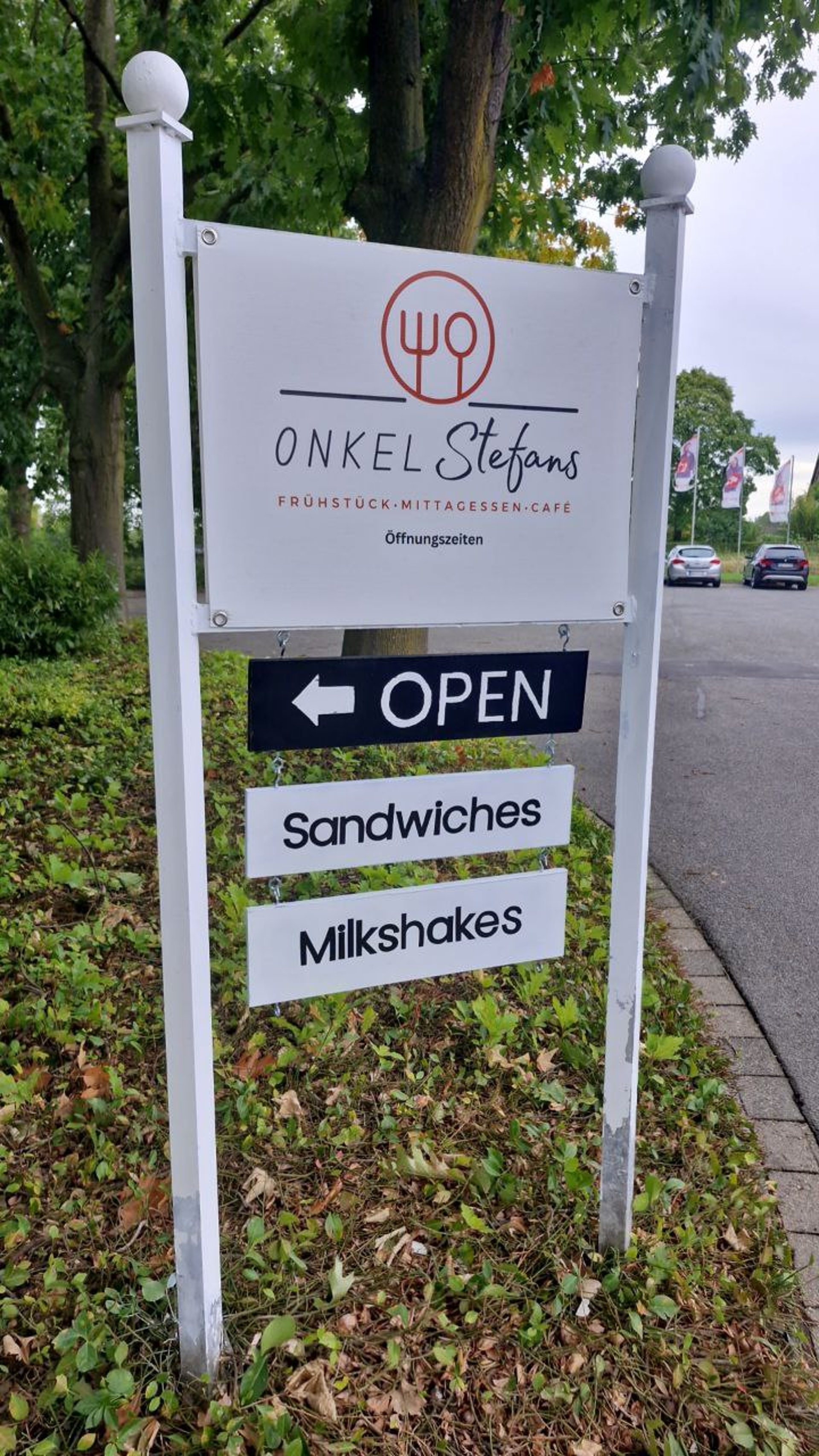 woman wearing yellow long-sleeved dress under white clouds and blue sky during daytime