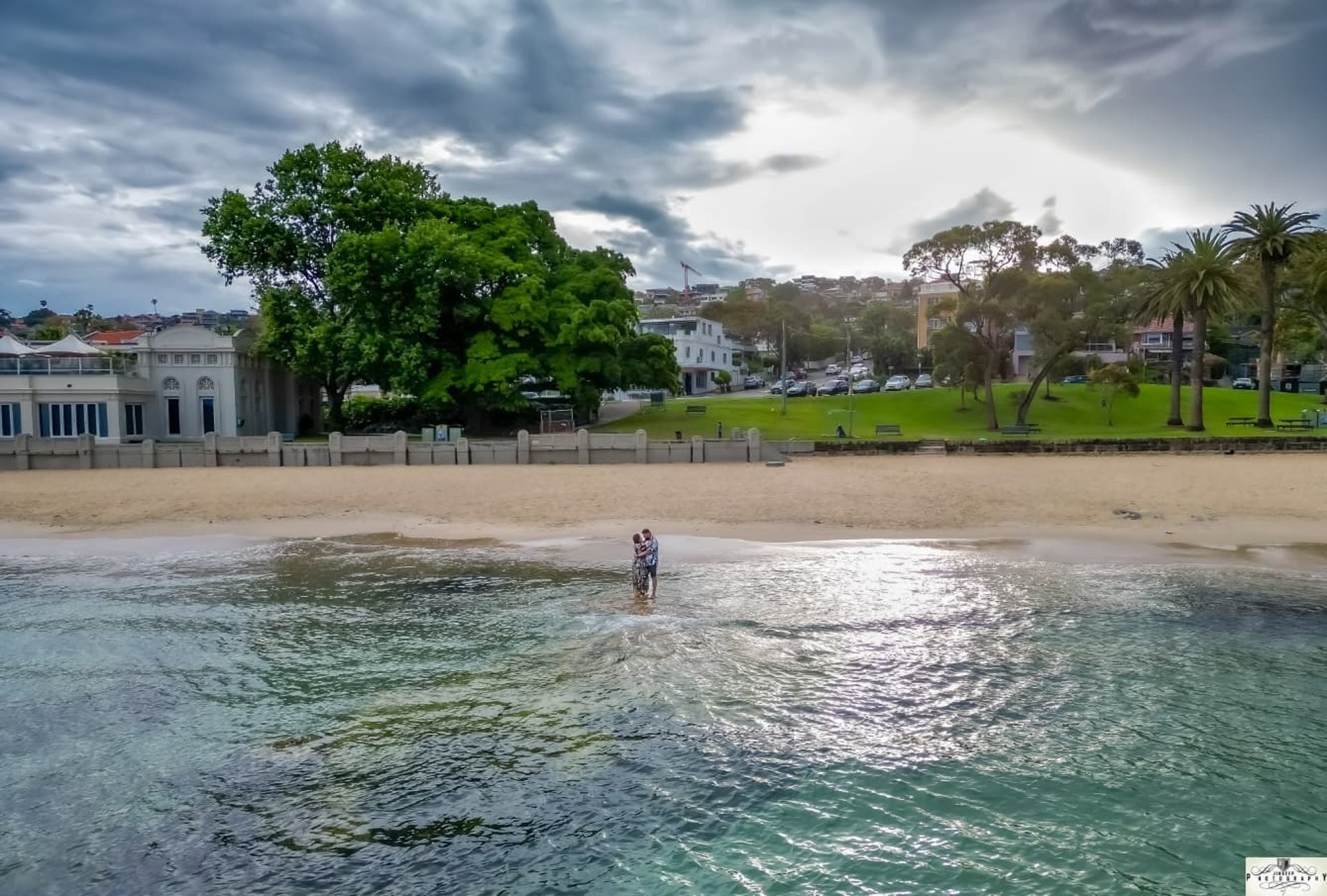 woman wearing yellow long-sleeved dress under white clouds and blue sky during daytime