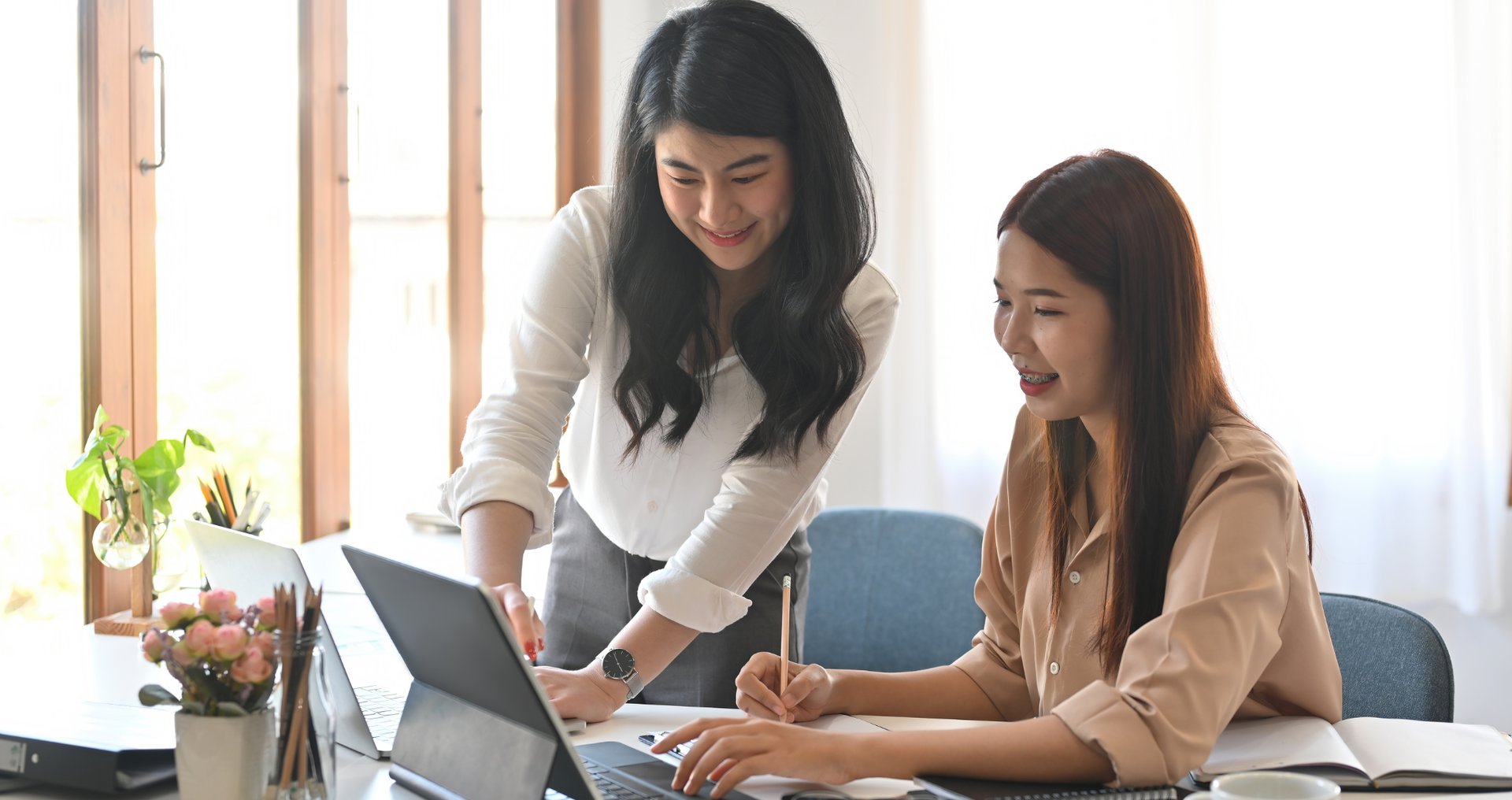 an abstract photo of a curved building with a blue sky in the background