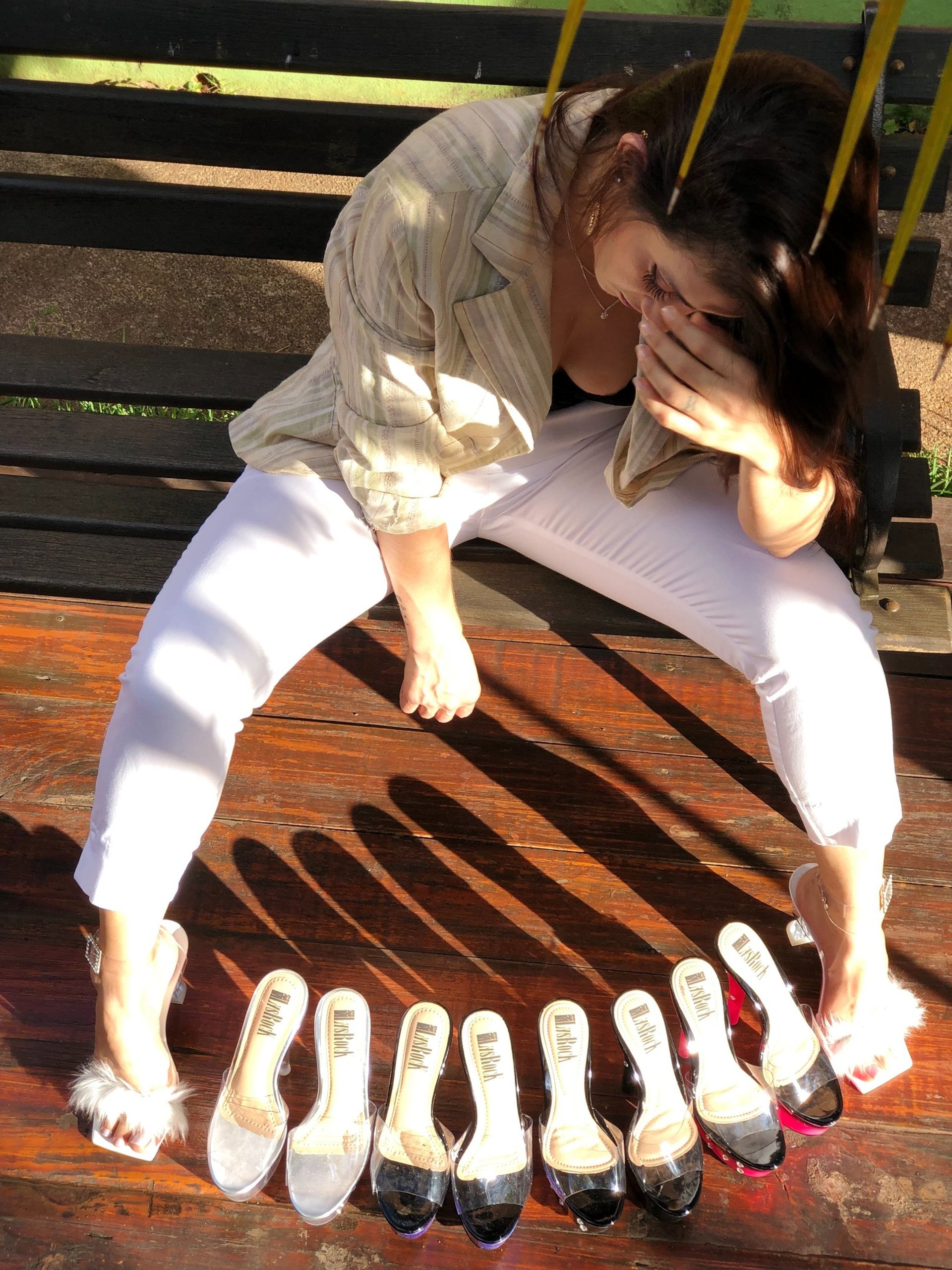 woman wearing yellow long-sleeved dress under white clouds and blue sky during daytime
