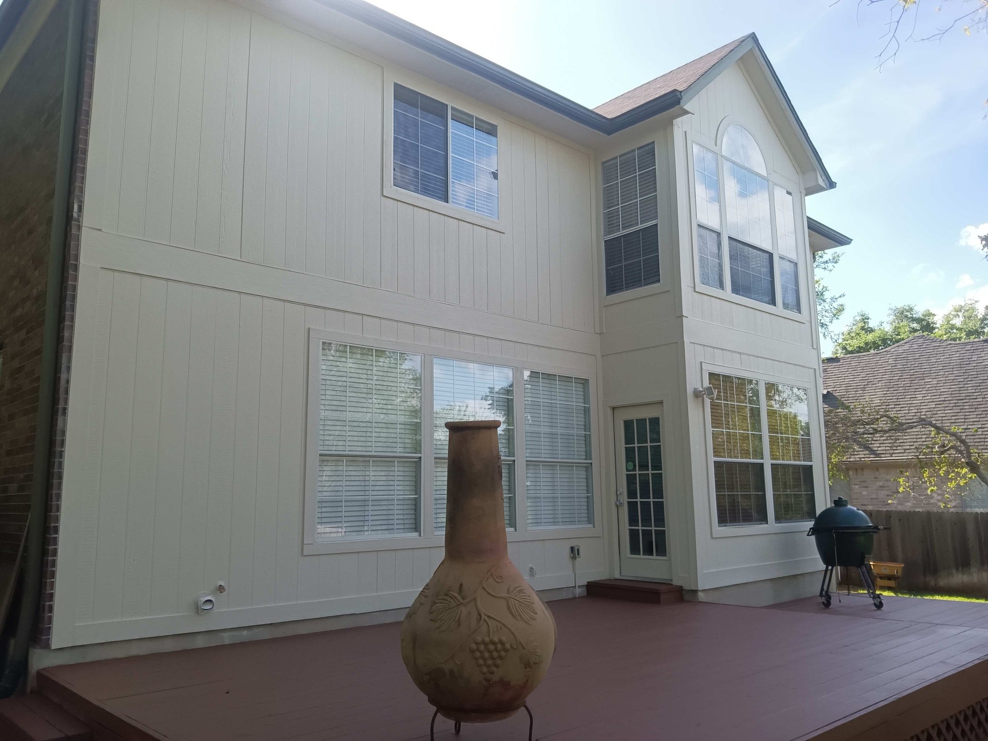 two men in ladder on wall