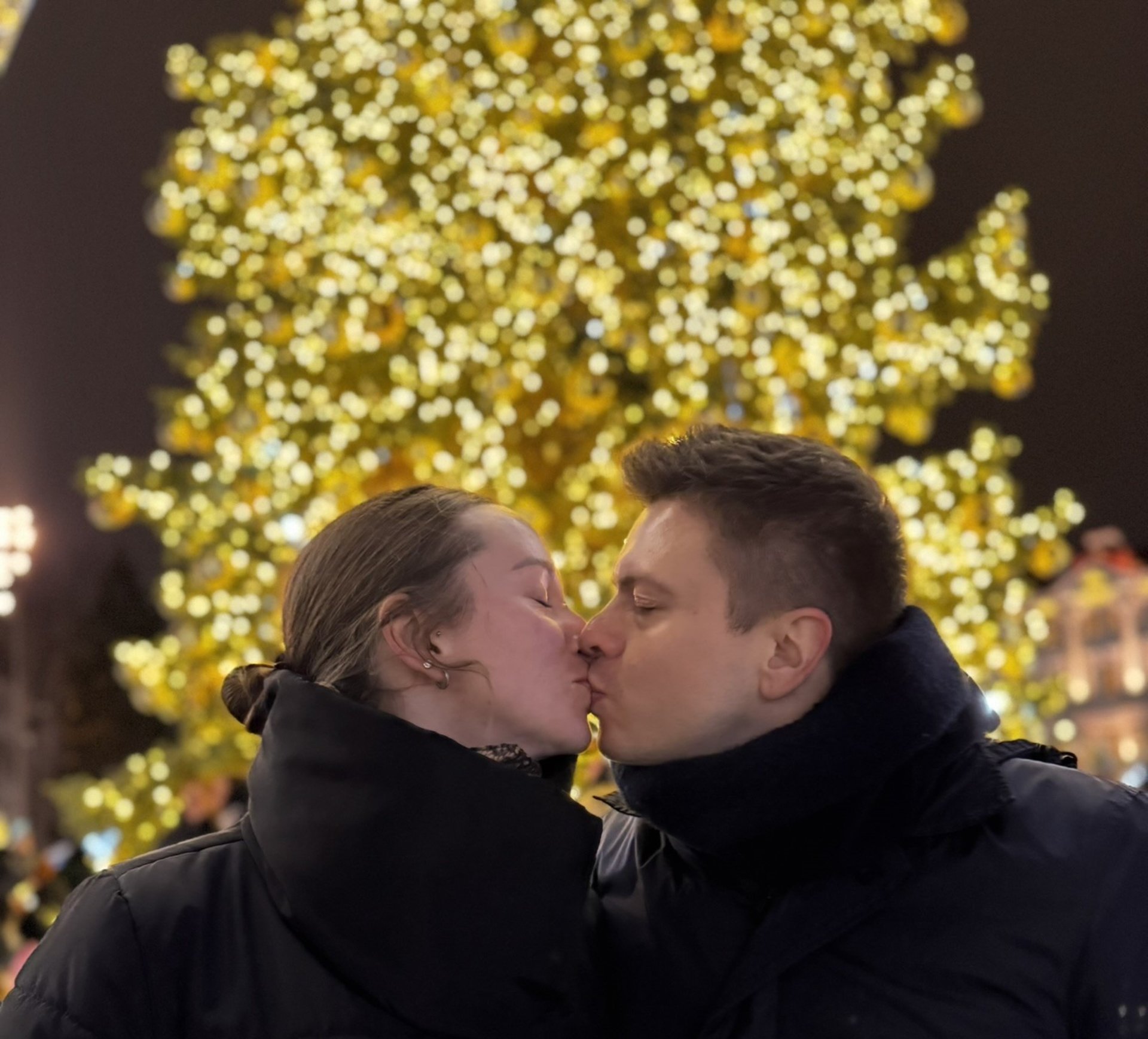 couple wearing silver-colored rings