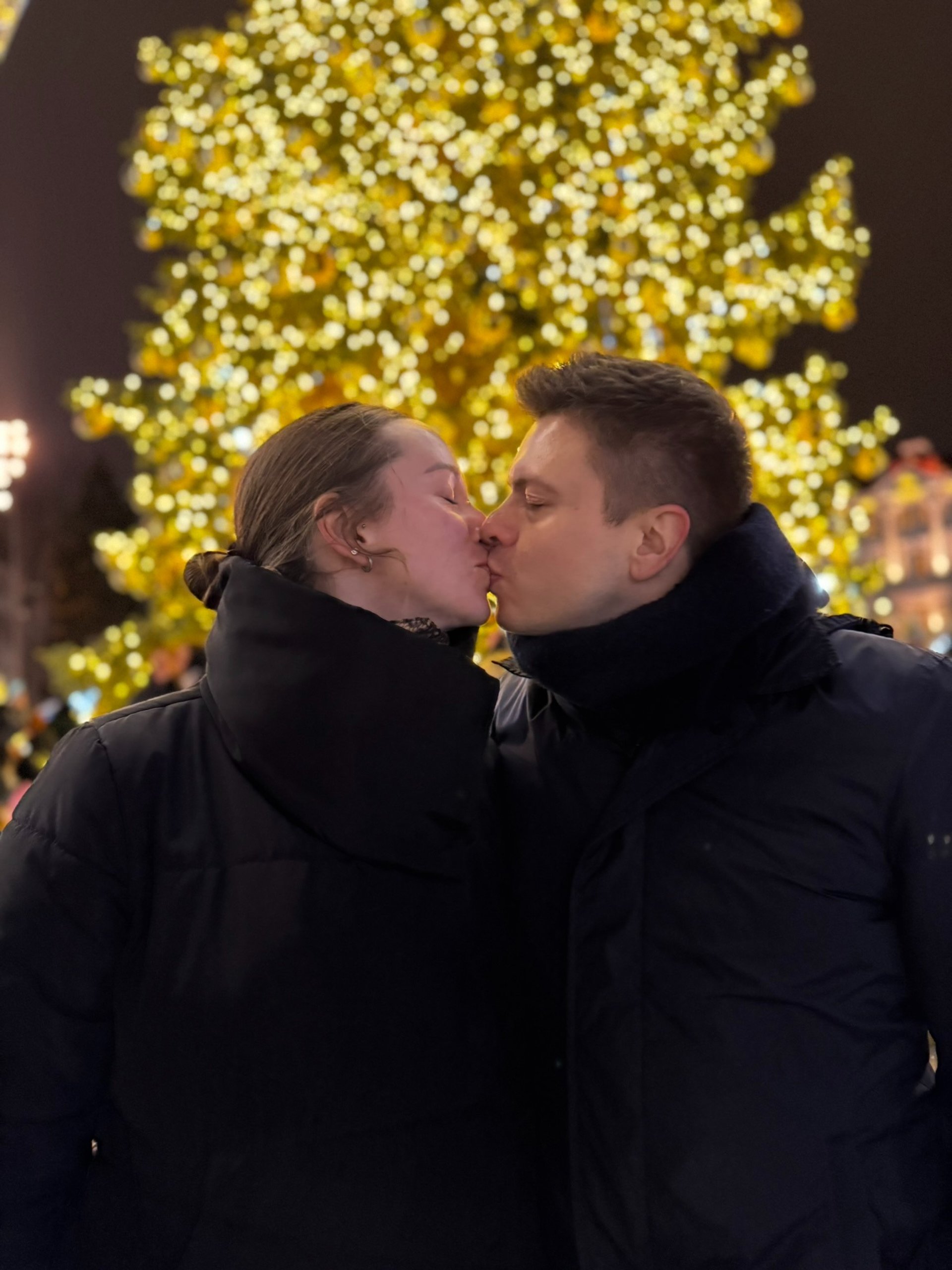 couple wearing silver-colored rings