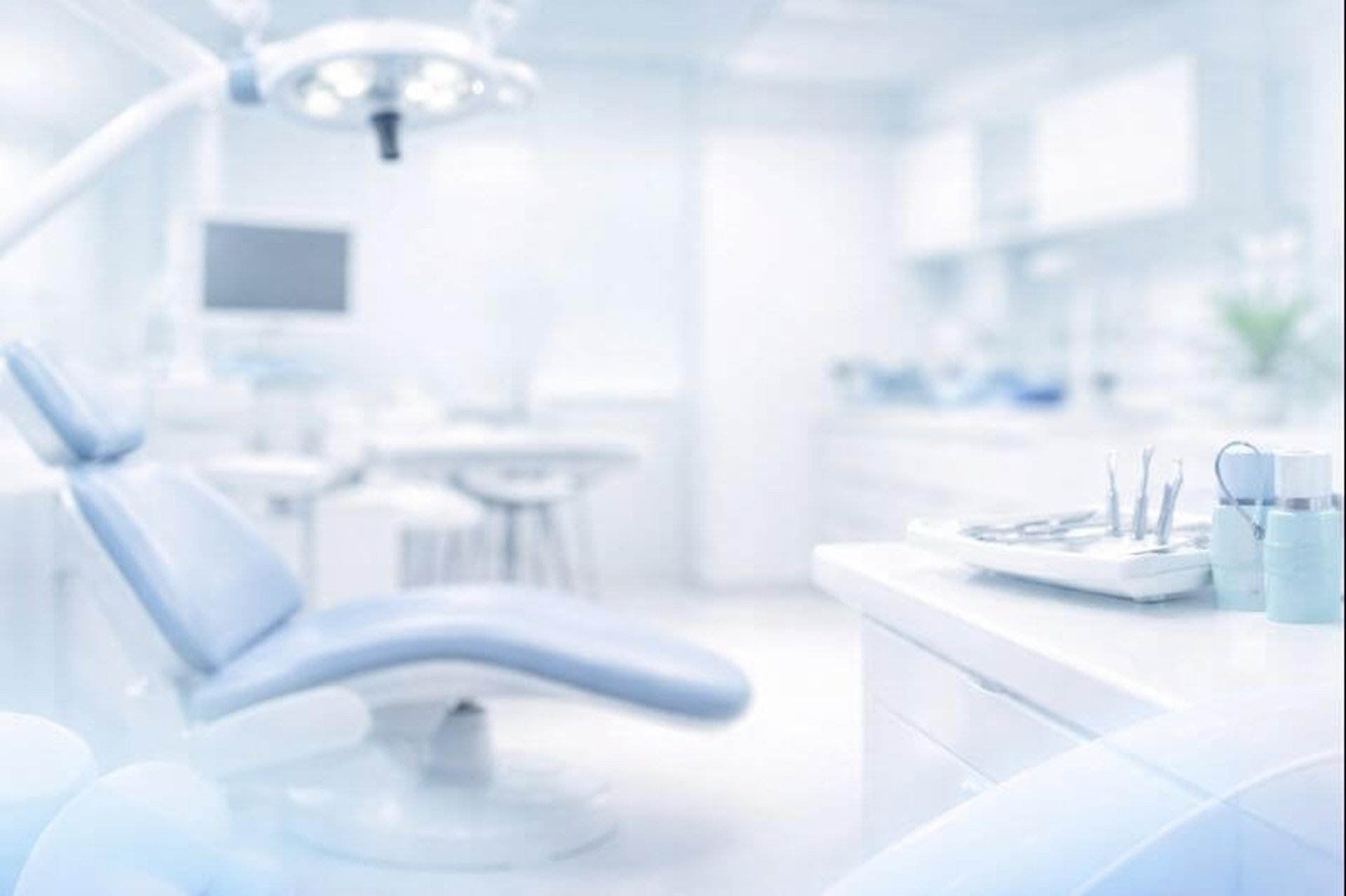 Modern, clean dental clinic interior used as background for dental services section