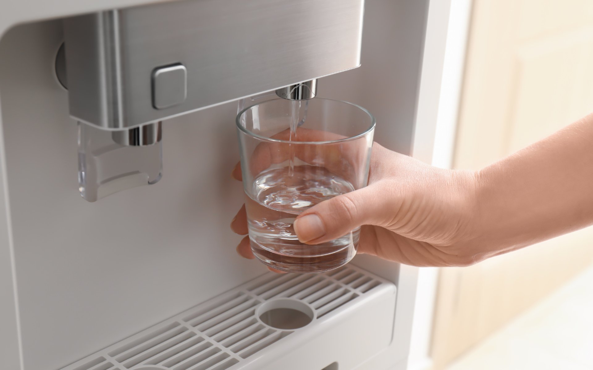man welding a black metal