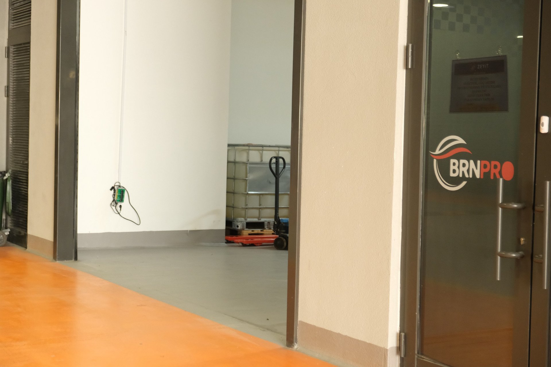 an abstract photo of a curved building with a blue sky in the background