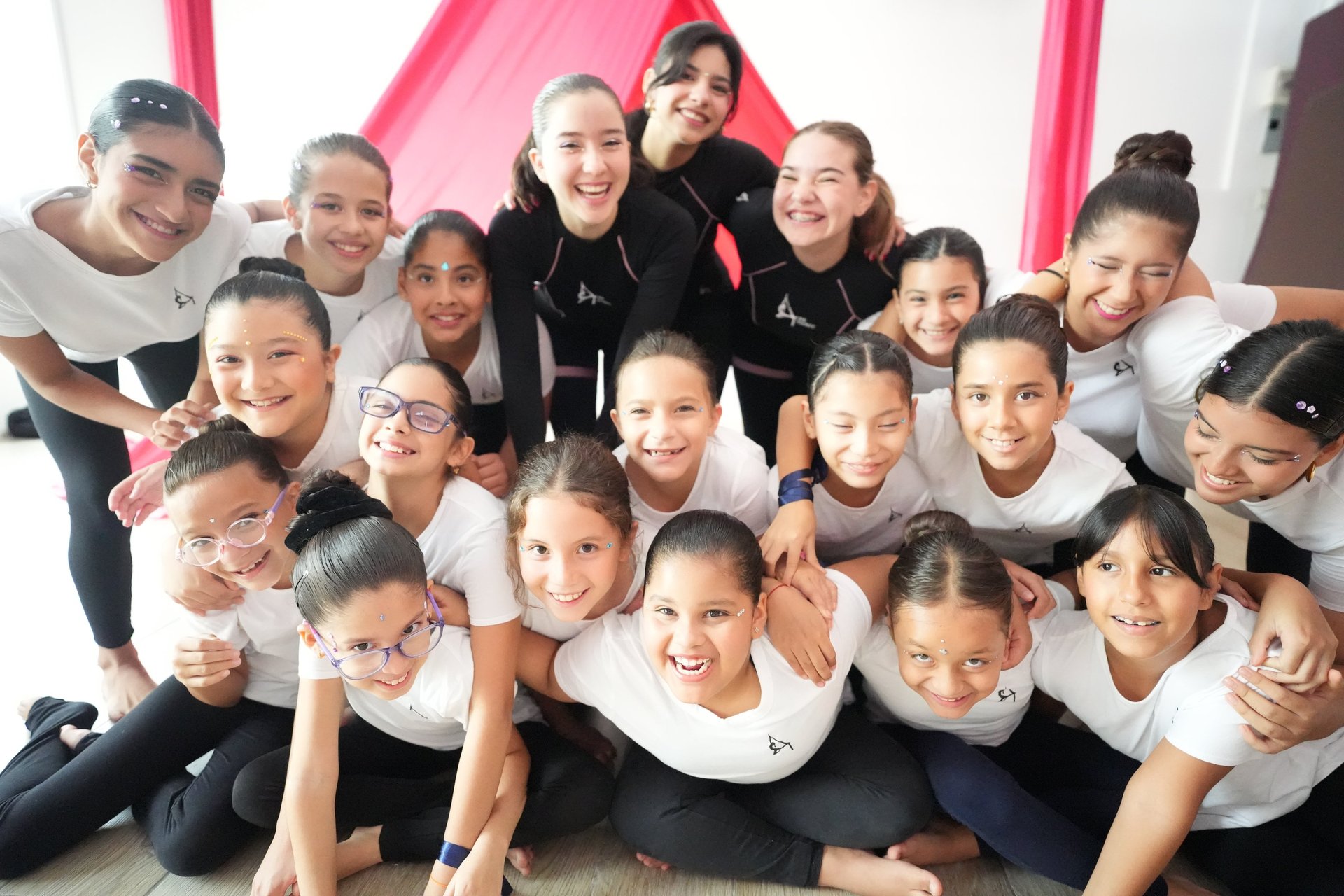 an abstract photo of a curved building with a blue sky in the background