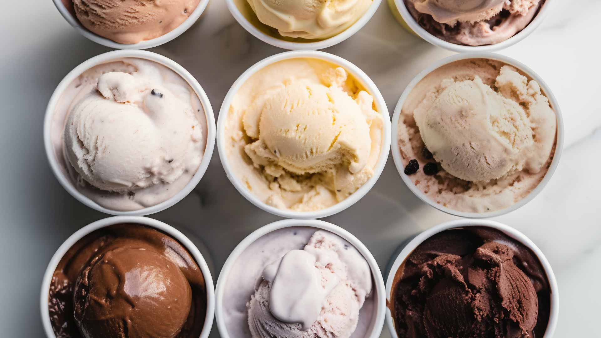 an abstract photo of a curved building with a blue sky in the background