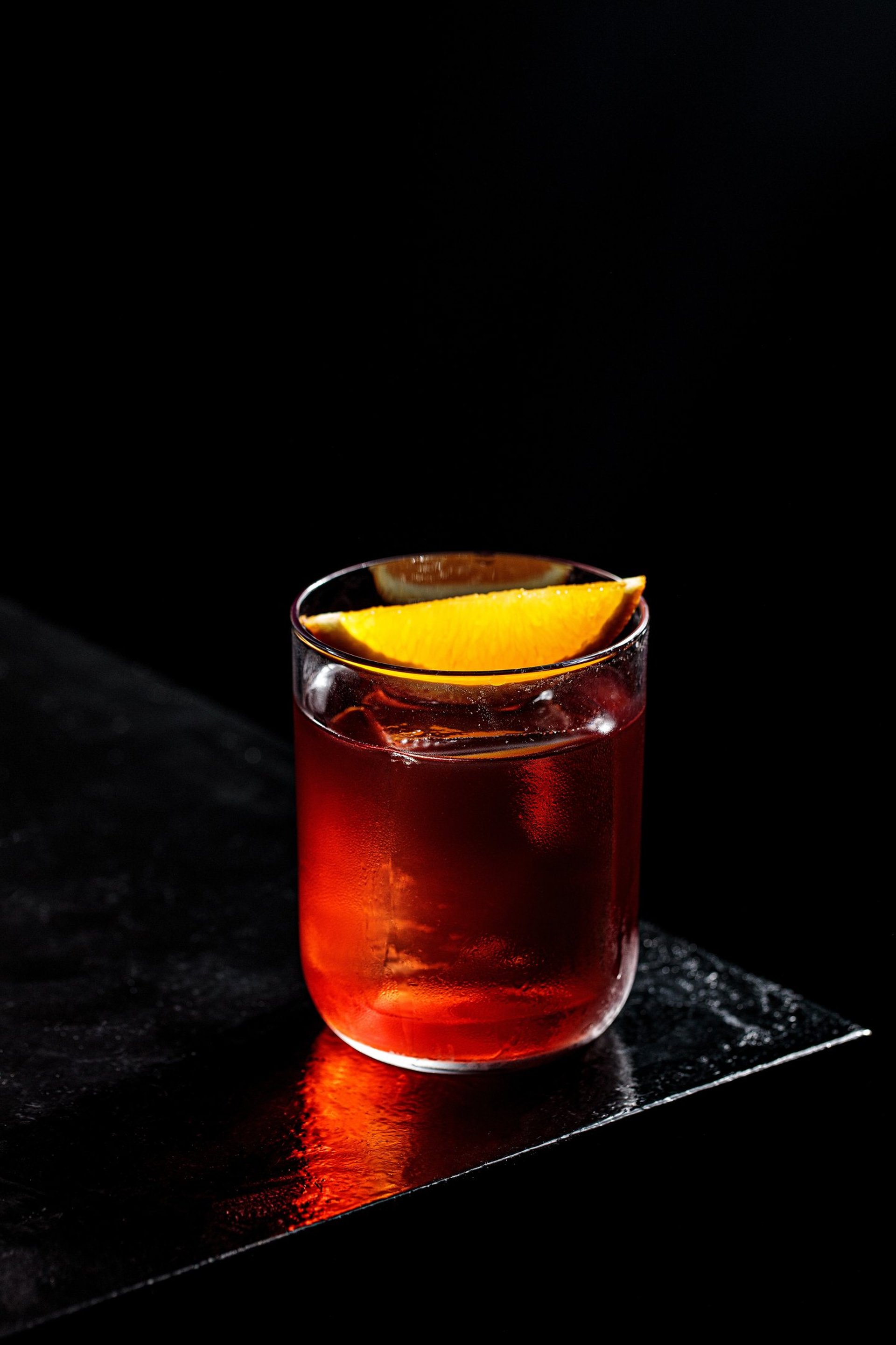 blue sofa chair beside brown wooden table