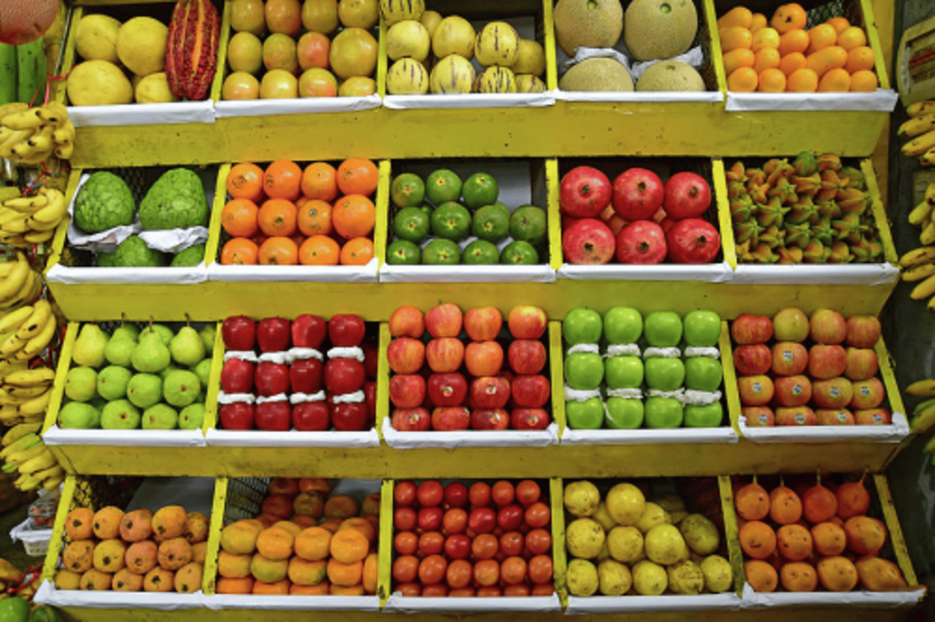 an abstract photo of a curved building with a blue sky in the background