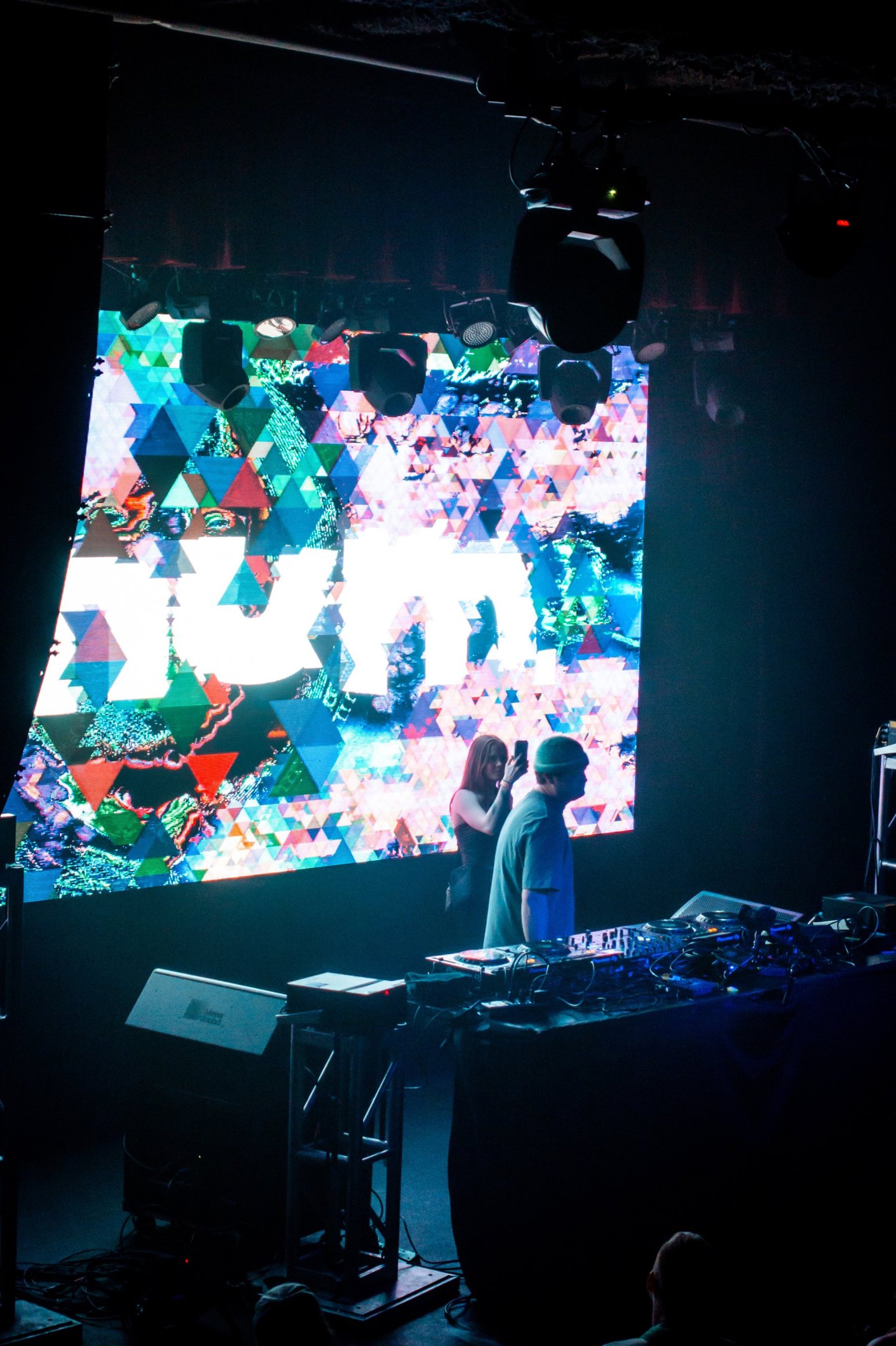 aerial photography of building in between mountains