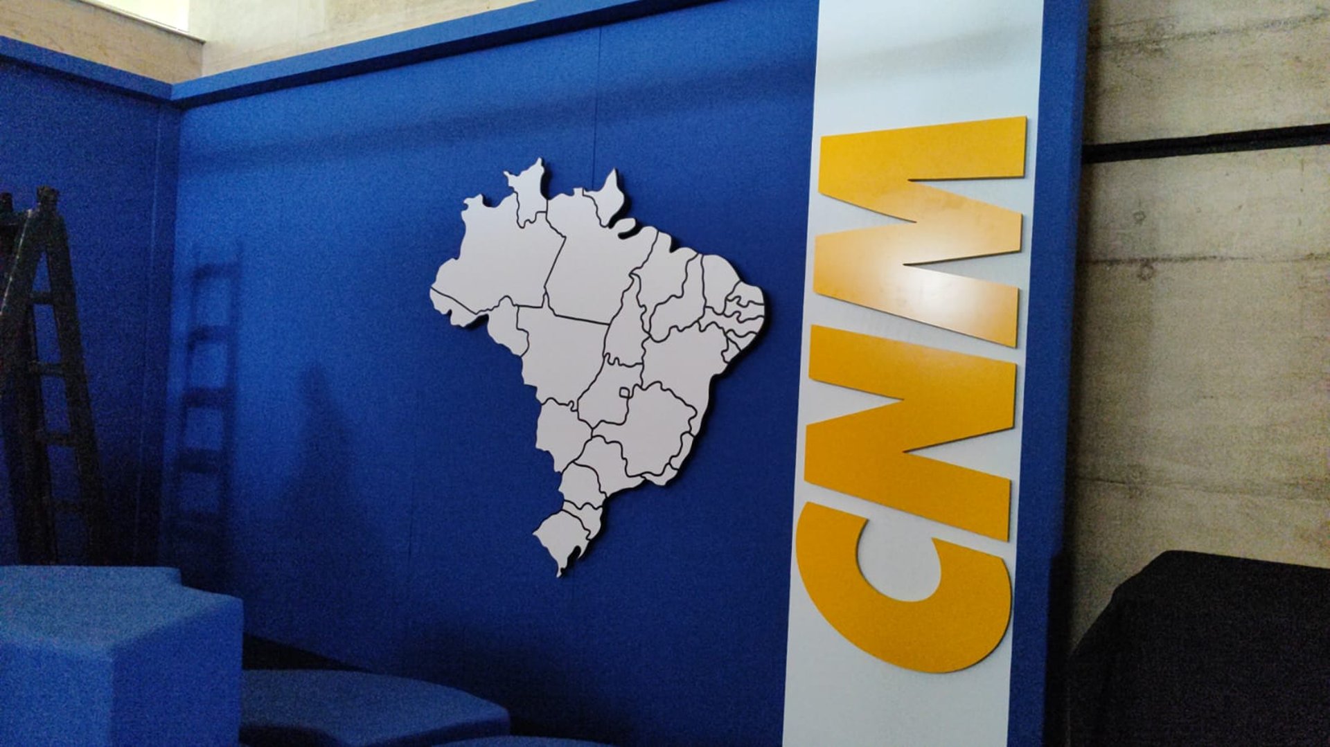 woman wearing yellow long-sleeved dress under white clouds and blue sky during daytime