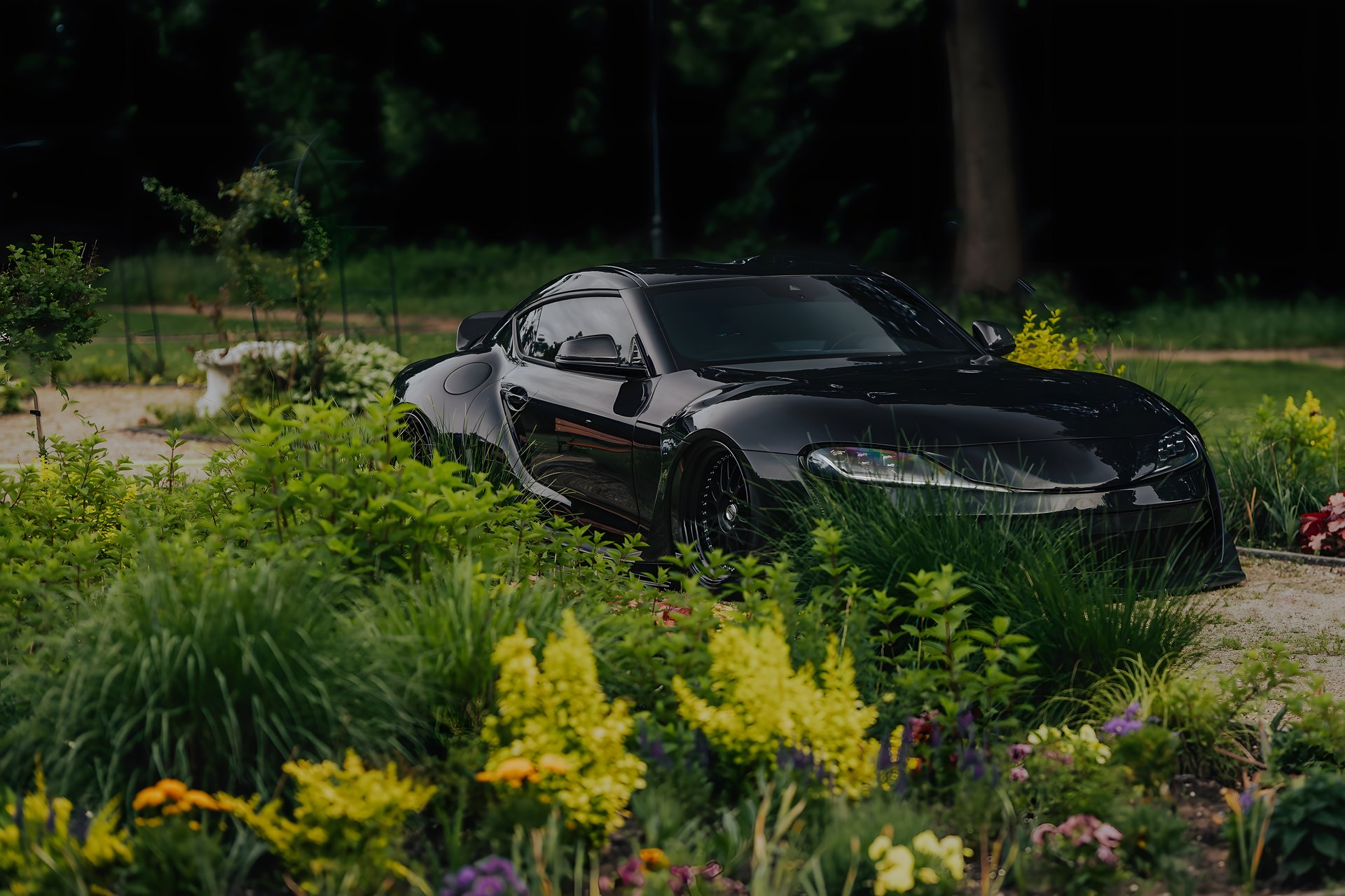 an abstract photo of a curved building with a blue sky in the background