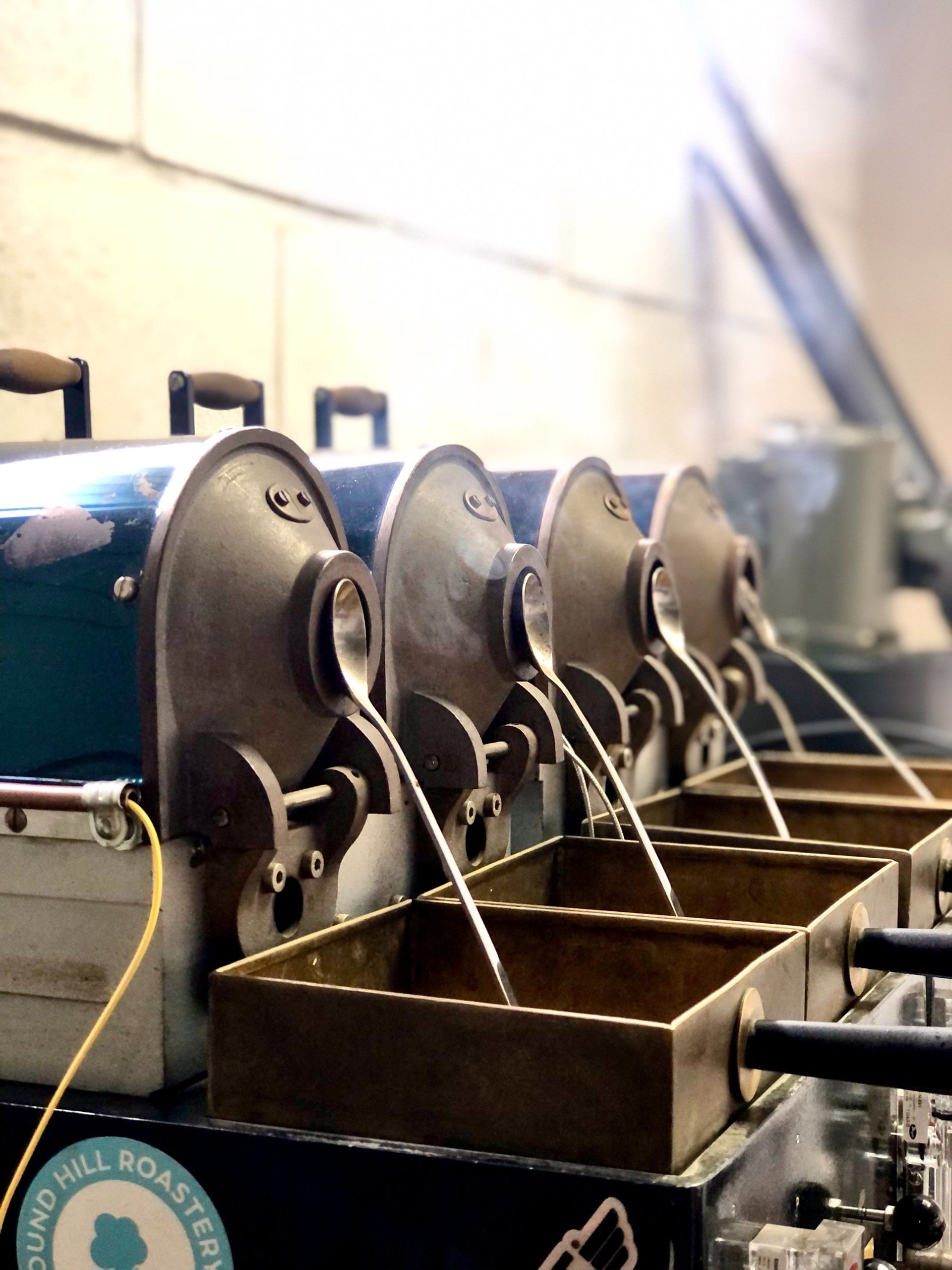 an abstract photo of a curved building with a blue sky in the background