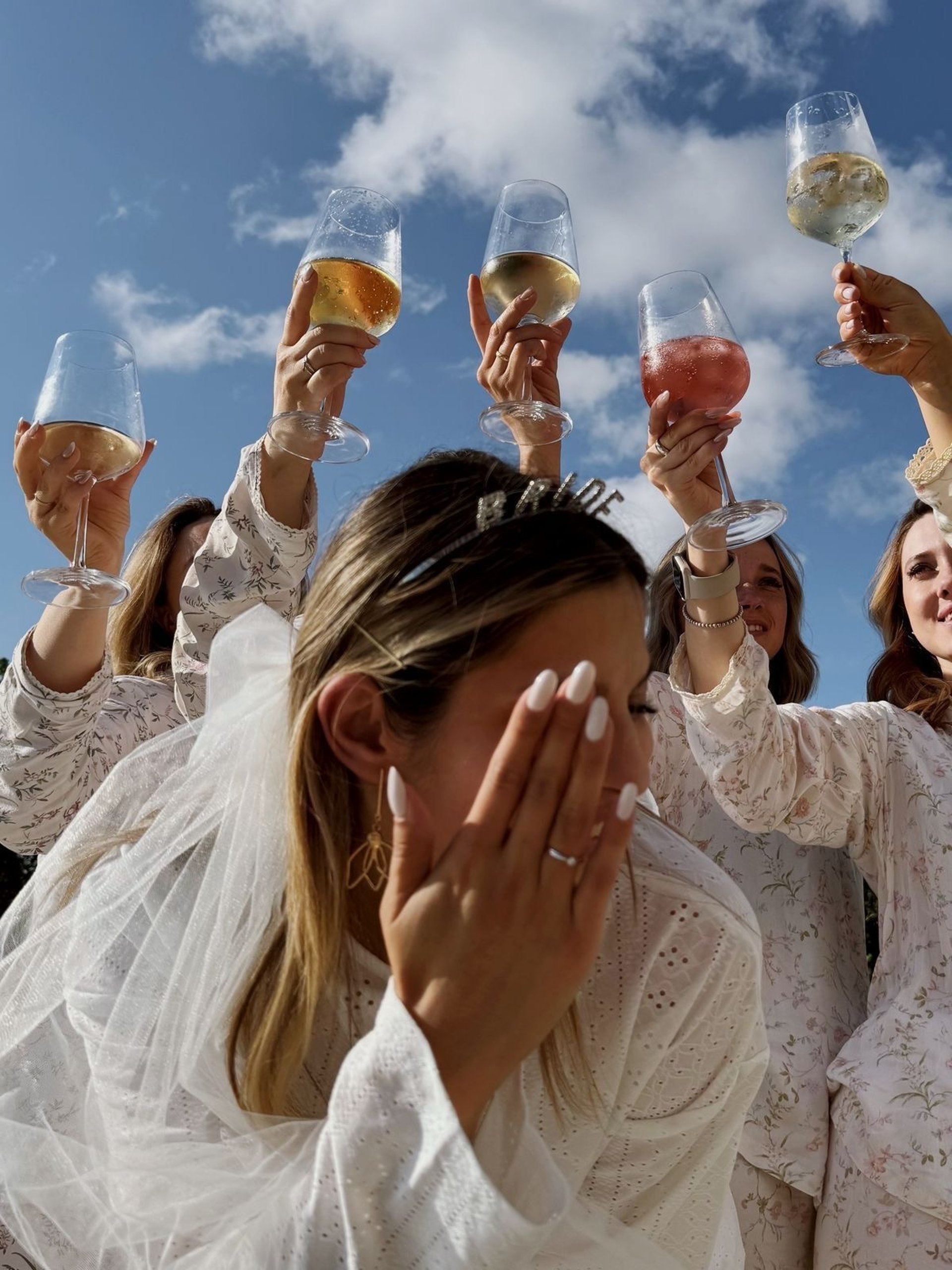 an abstract photo of a curved building with a blue sky in the background