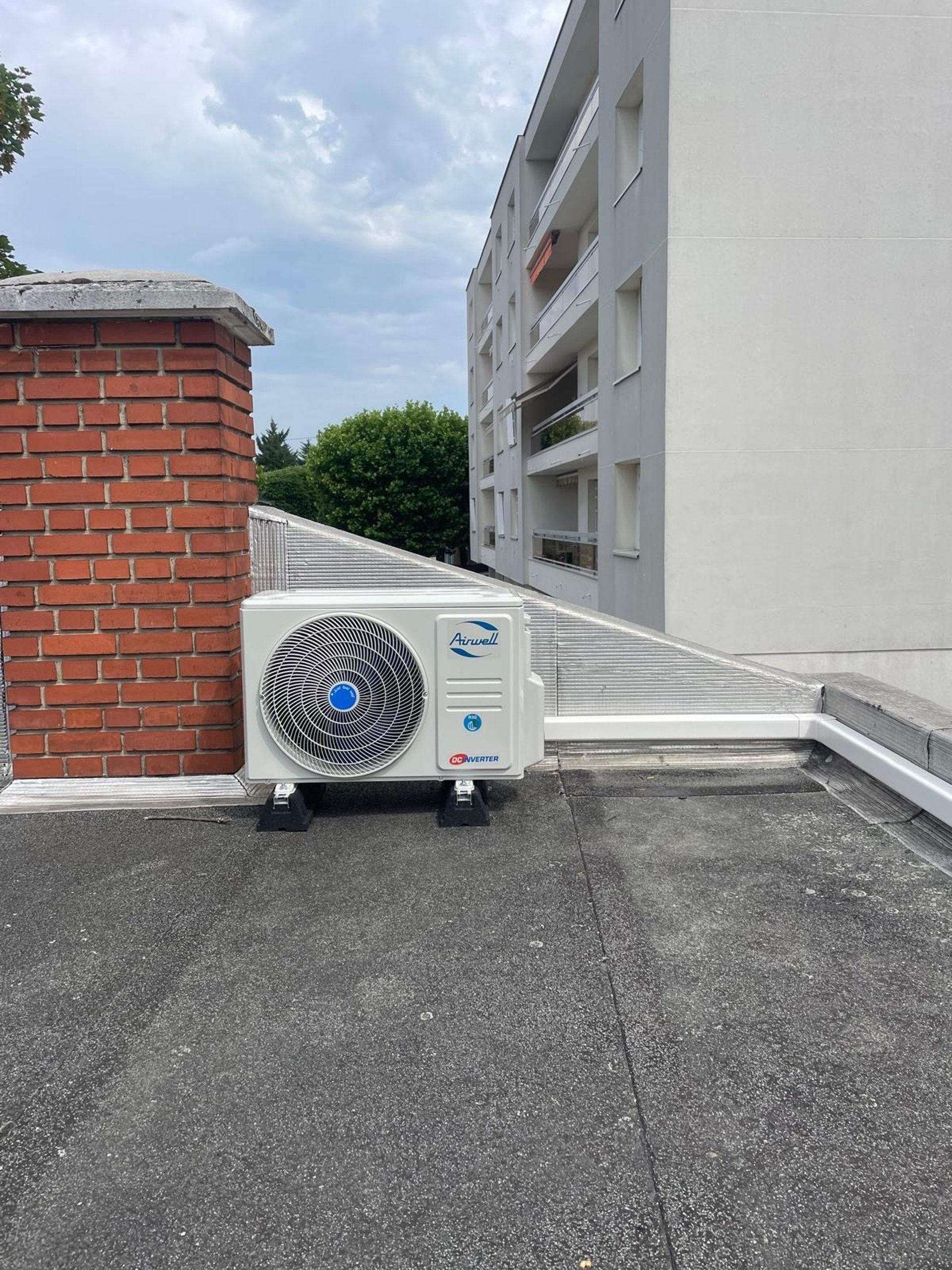 woman wearing yellow long-sleeved dress under white clouds and blue sky during daytime